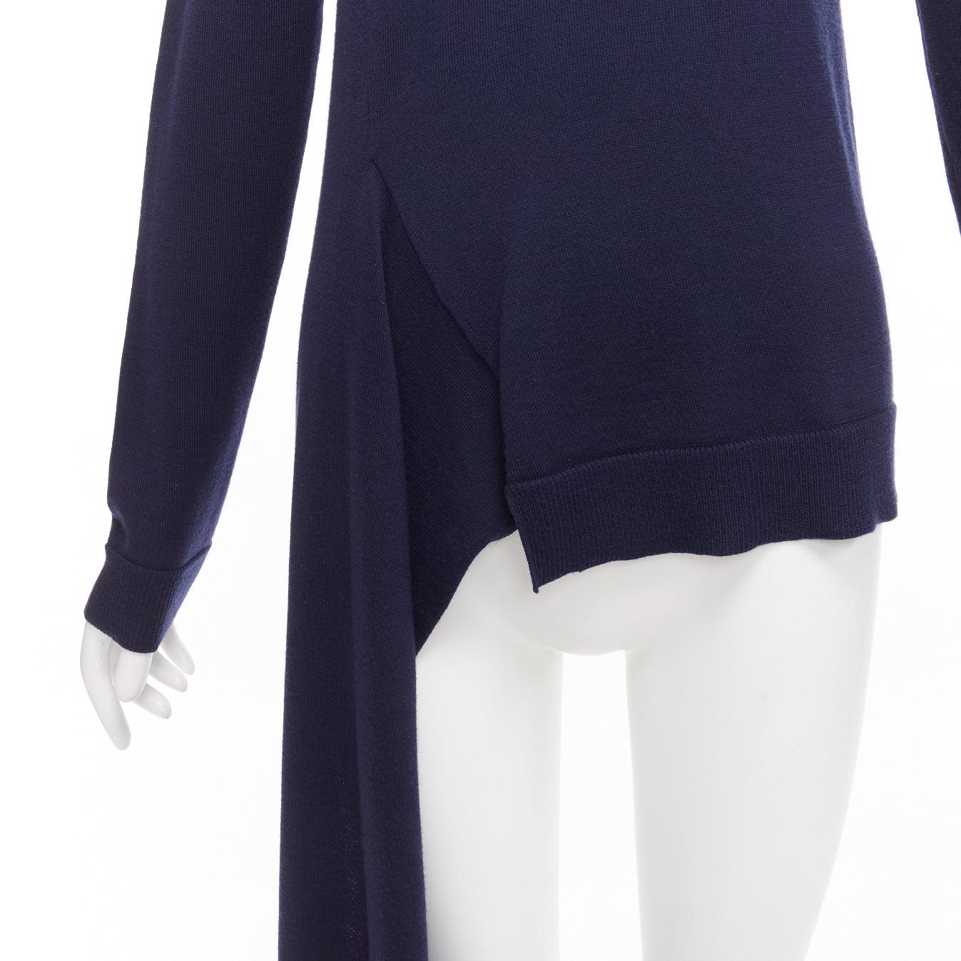PORTS 1961 navy wool v neck asymmetric hem drape sweater XS
Reference: NKLL/A00154
Brand: Ports 1961
Material: Wool
Color: Navy
Pattern: Solid
Closure: Pullover

CONDITION:
Condition: Fair, this item was pre-owned and is in fair condition. Please