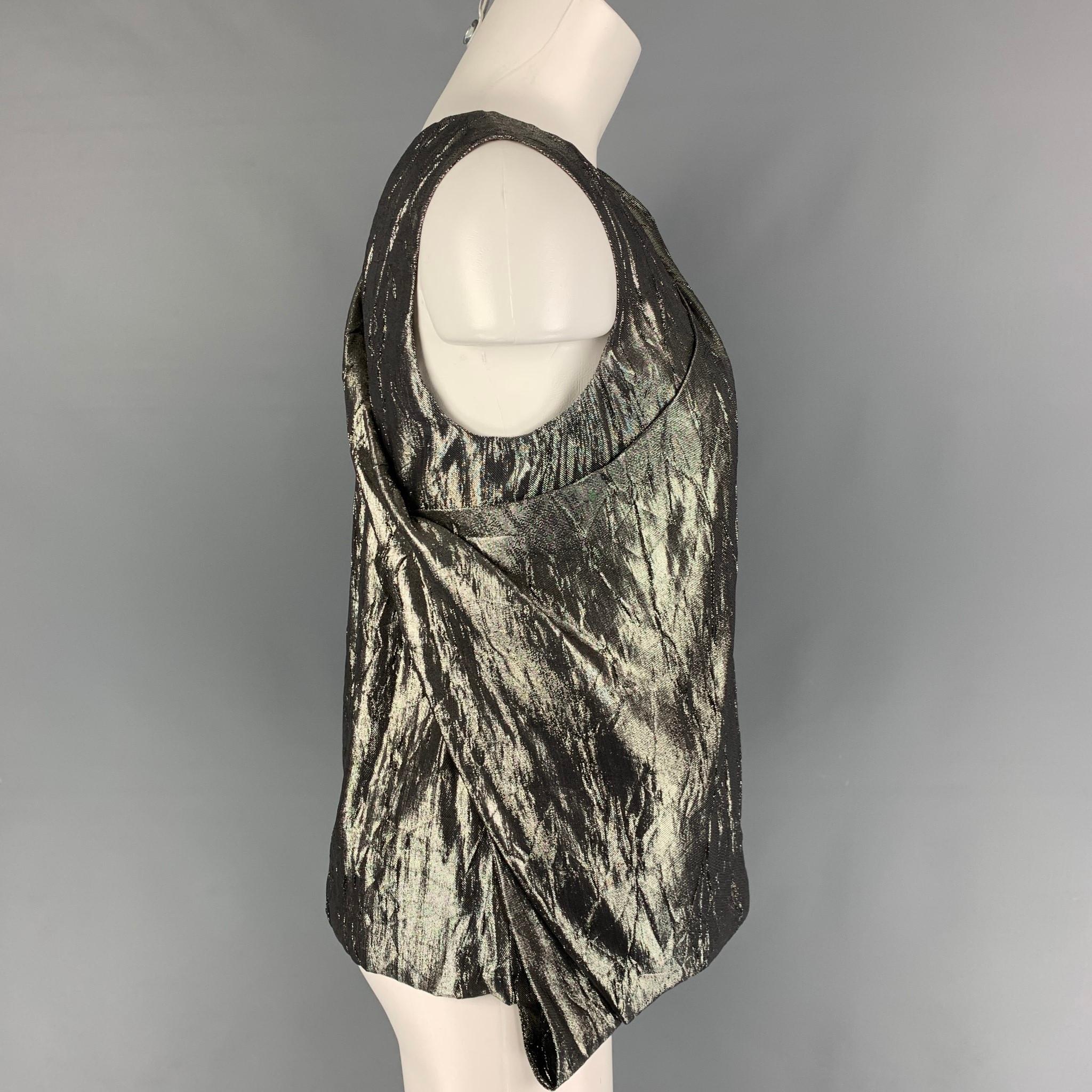PORTS 1961 dress top comes in a silver silk / polyester featuring a layered asymmetrical design, long length, and a sleeveless style. 

Very Good Pre-Owned Condition.
Marked: 6

Measurements:

Shoulder: 15.5 in.
Bust: 35 in.
Length: 52 in. 