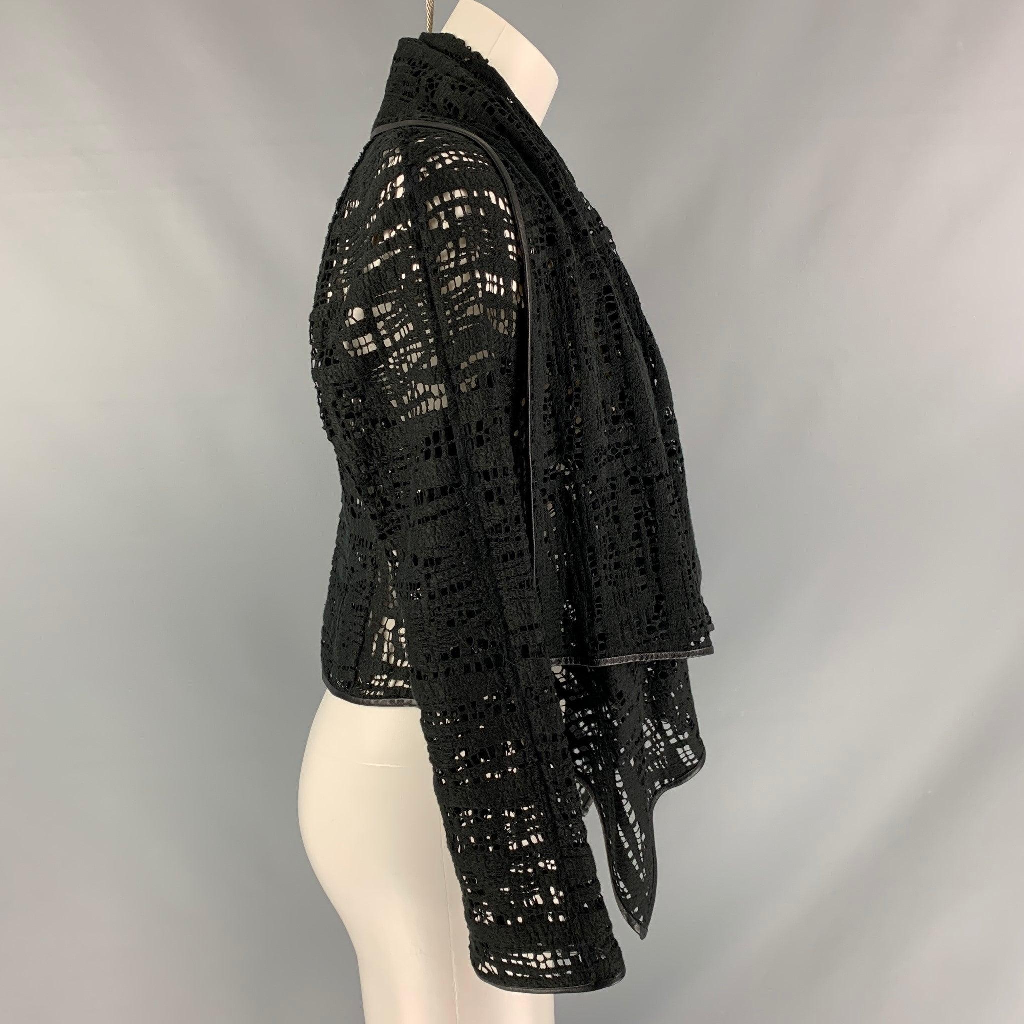 PORTS 1961 long sleeve cardigan comes in a black lace featuring an asymmetrical style and leather trim.Very Good Pre-Owned Condition. Fabric Tag Removed. 

Marked:   8 

Measurements: 
 
Shoulder: 18.5 inches Bust: 35 inches Sleeve: 21 inches