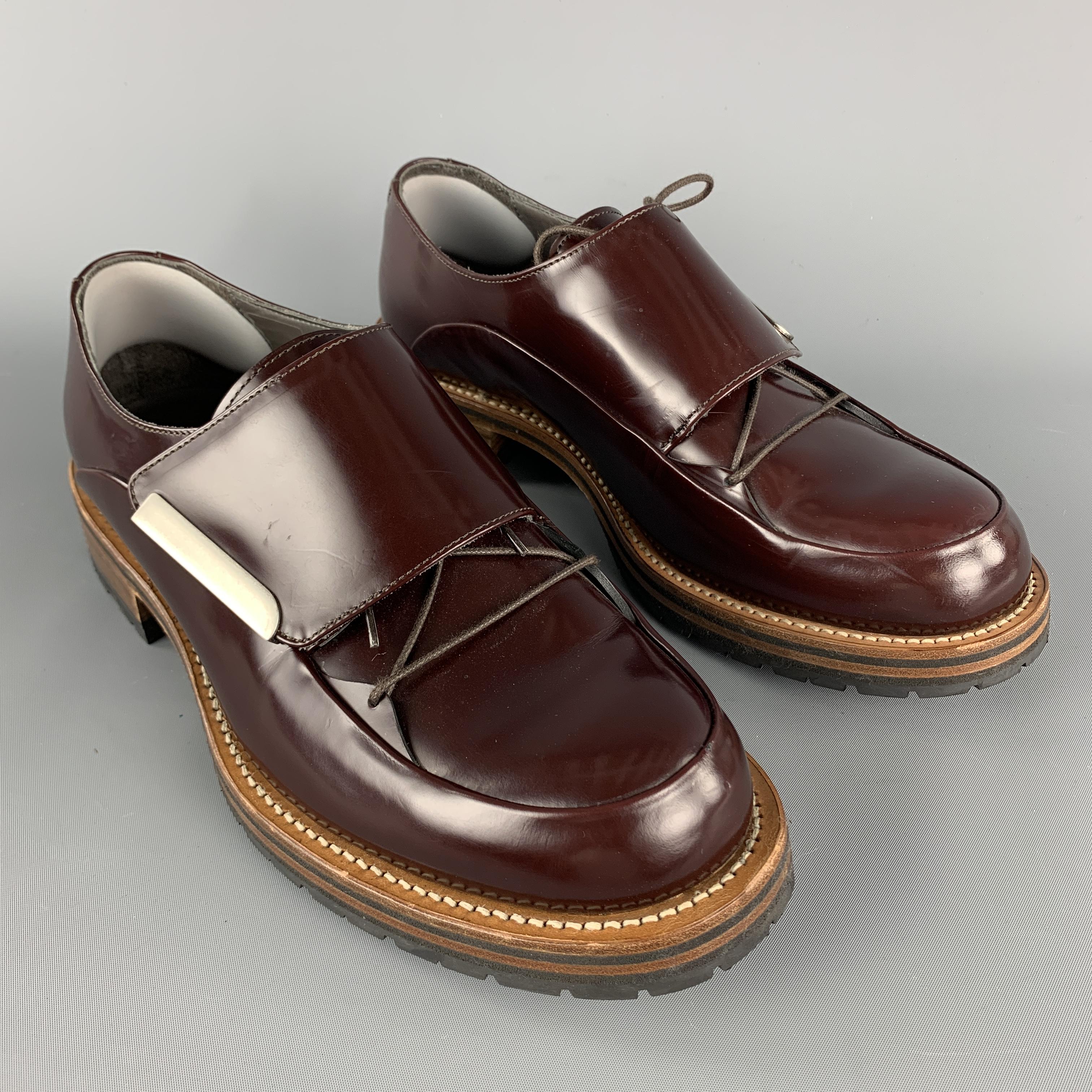 PORTS 1961 Lace Up Shoes comes in burgundy solid leather material, with a tab closure, and a silver metal tone hardware.  Made in Italy.

Excellent Pre-Owned Condition.
Marked: 41

Outsole: 12 x 4.5 in.