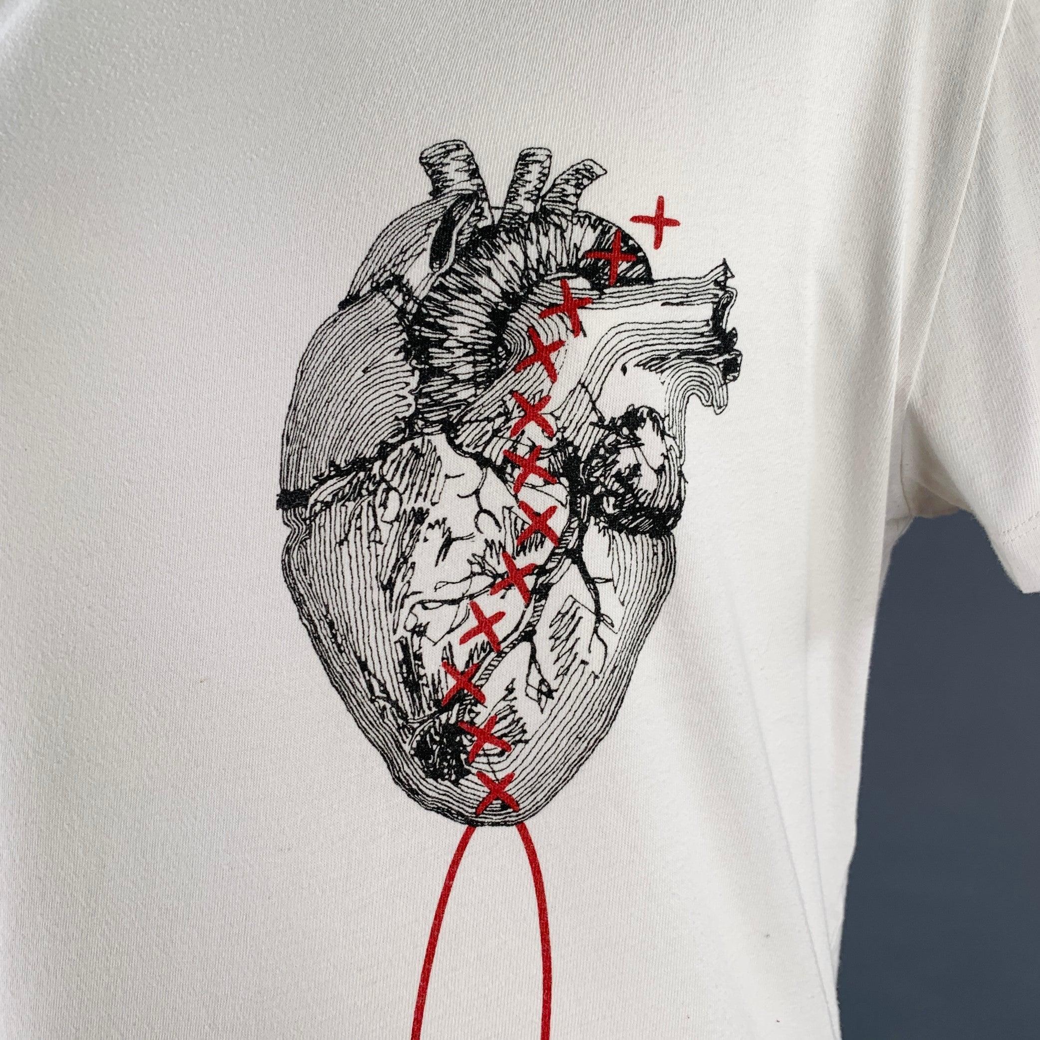 PORTS 1961 t-shirt
in a white cotton jersey featuring black anatomical heart with red stitches print, short sleeves, and crew neck. Very Good Pre-Owned Condition. Moderate pilling. 

Marked:   XL 

Measurements: 
 
Shoulder: 20 inches Chest: 44