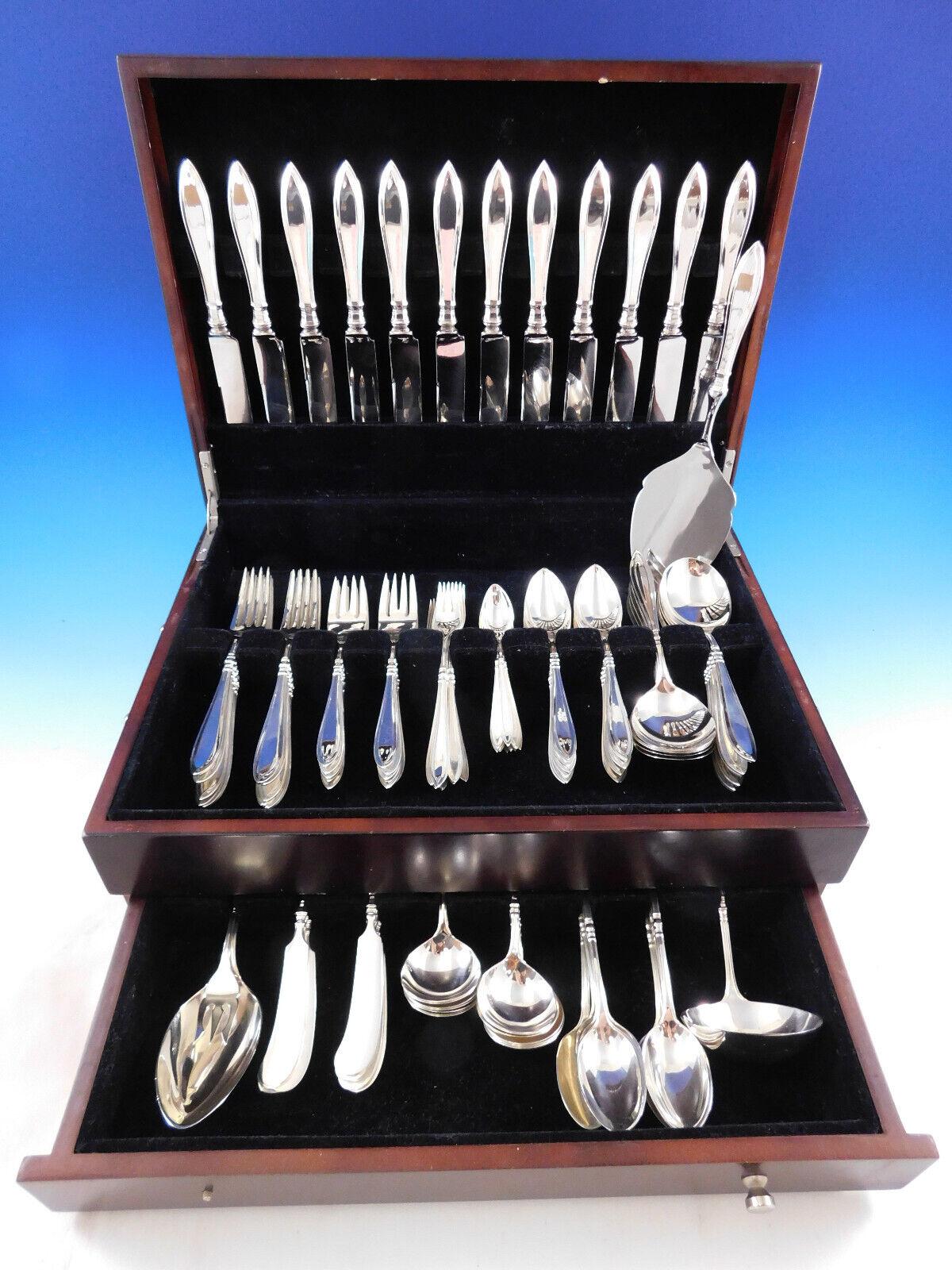 Superb Portsmouth by Gorham sterling silver flatware set - 98 pieces. This pattern features a timeless pointed unadorned handle design. This set includes:

12 Knives, 8 1/2