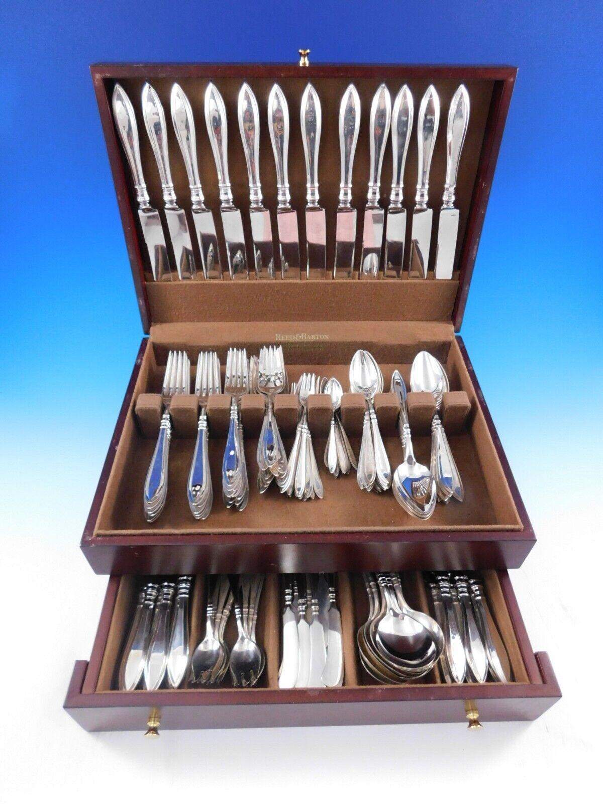Monumental Portsmouth by Gorham sterling silver flatware set -  pieces. This pattern features a timeless modern pointed unadorned handle design. This set includes:

12 Dinner Size Knives w/blunt plated blades, 9 7/8