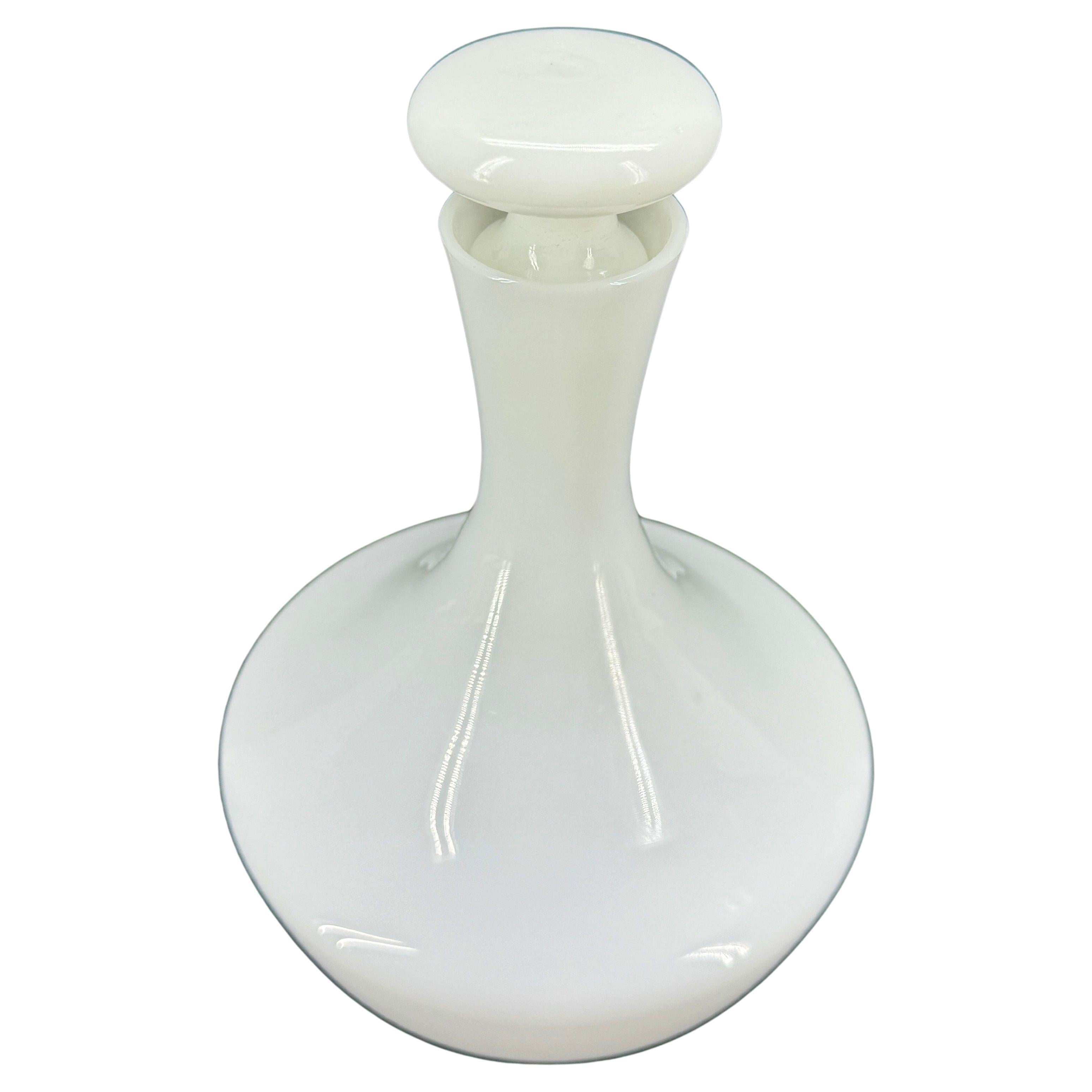 Mid-Century Glass Opaline Decanter from Portugal. This piece is versatile on a bar cart as well as a shelf. Impressive wear can be seen throughout.