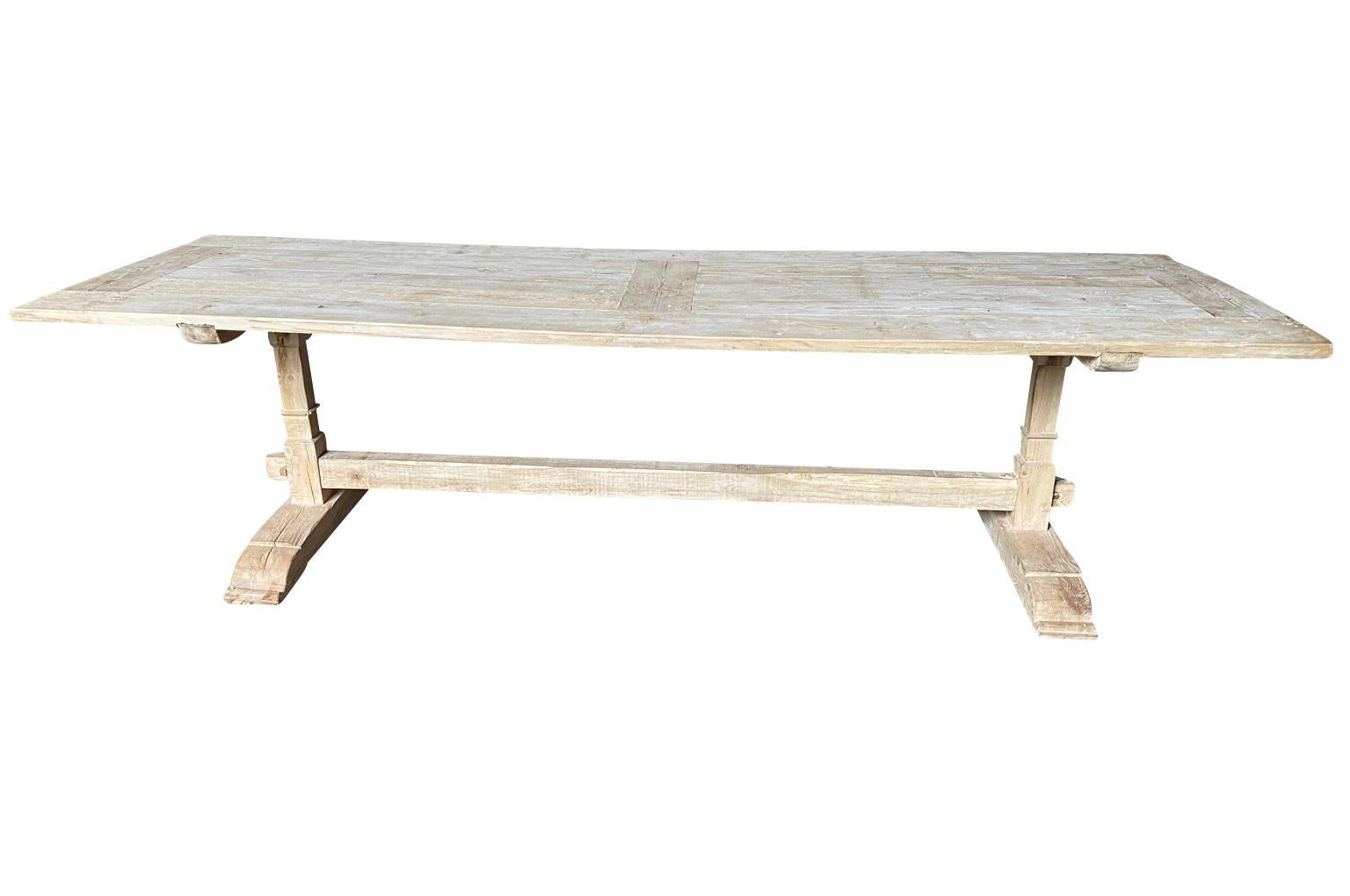 A very charming 17th century style Farm House - Trestle Table from Portugal.  Soundly constructed from pine.  A wonderful table for large family gatherings.