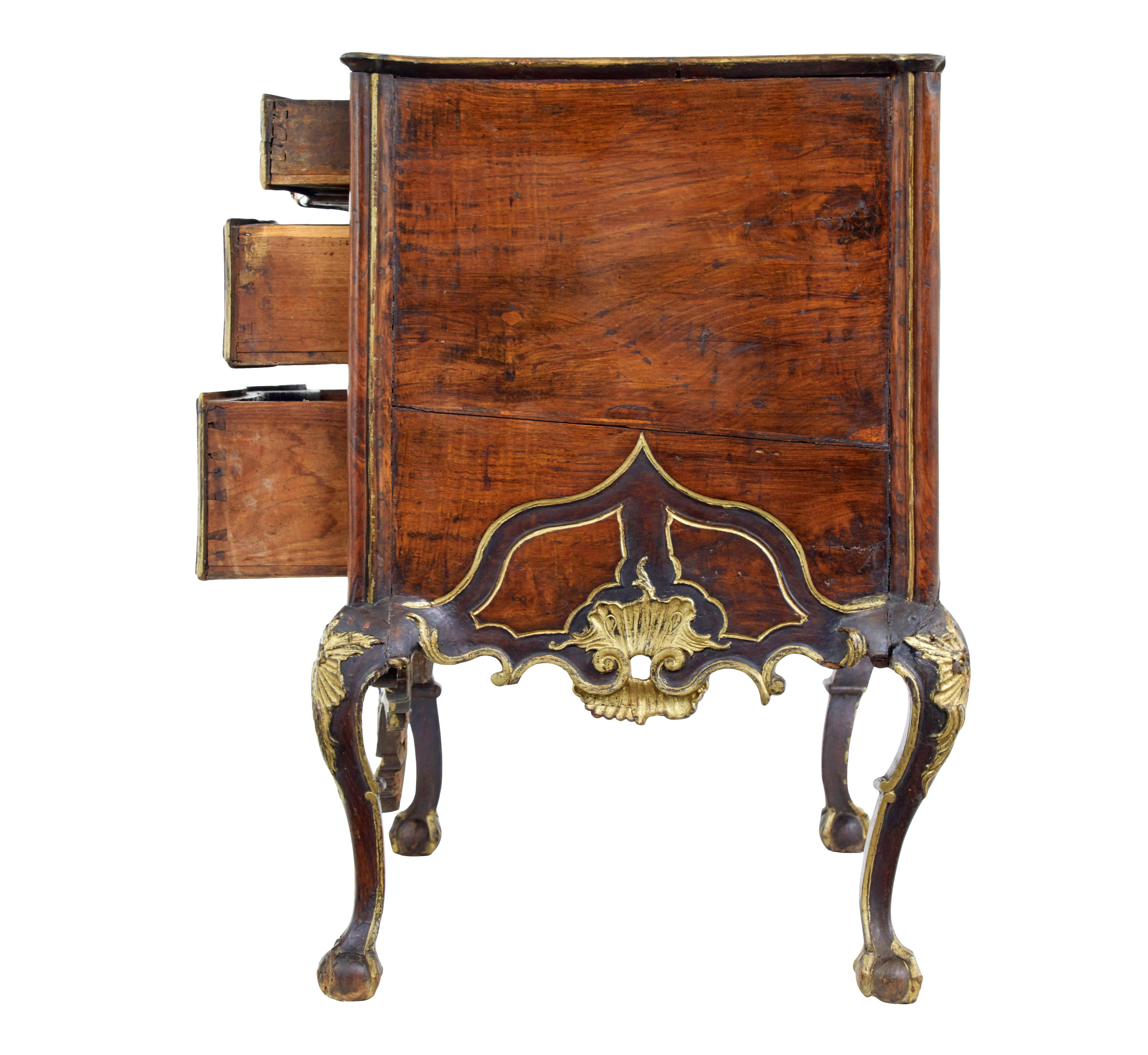 Hand-Carved Portuguese 18th century carved walnut and gilt chest of drawers For Sale