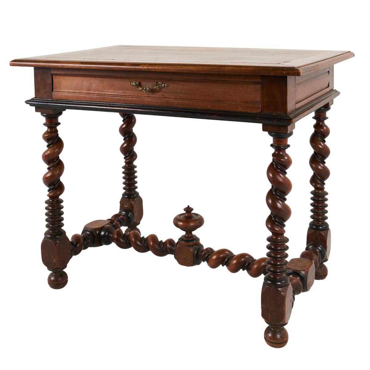 This 18th-century Portuguese side table is a handsome and versatile piece featuring wonderful spiral turned legs and a single drawer. Made of walnut, it has a warmth, presence and infinite uses.
 