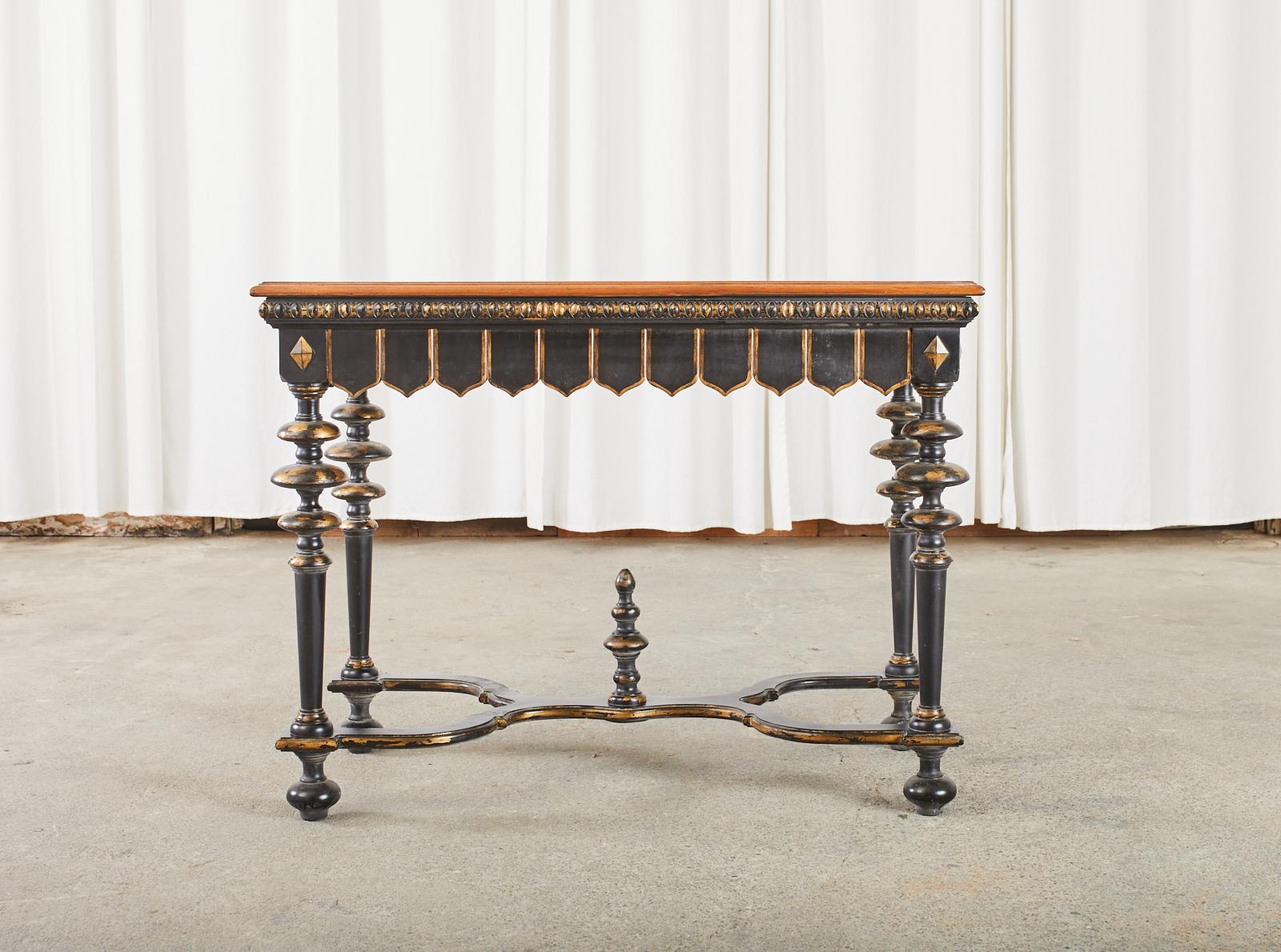 Distinctive ebonized console table or library table crafted in the Portuguese baroque style. The table features a gadrooned border above the frieze with geometric shaped moldings below. The trestle style base has dramatic turned legs ending with