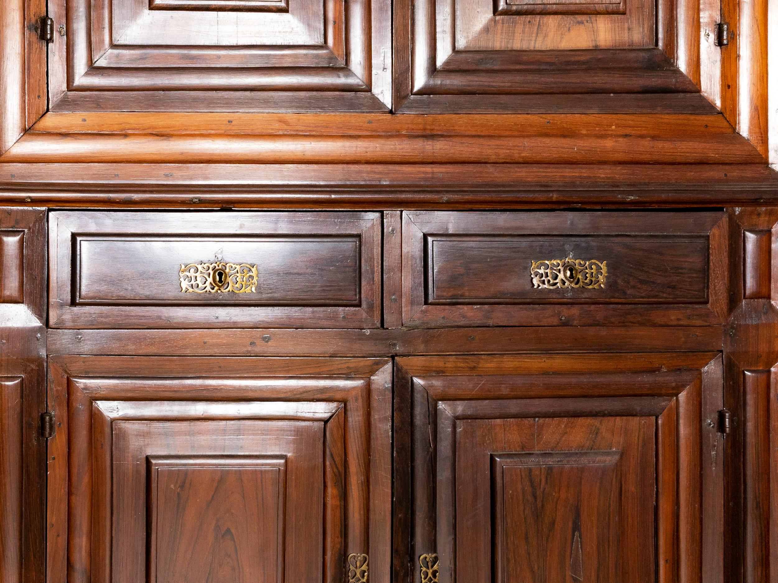  A 17th Century Wardrobe unit in solid Brazilian rosewood, four large sized doors and two large drawers with details and interior in Vinhático wood (Madeira Mahogany), brass hardware, paneled doors and itched rosewood friezes. 
In good conditions,