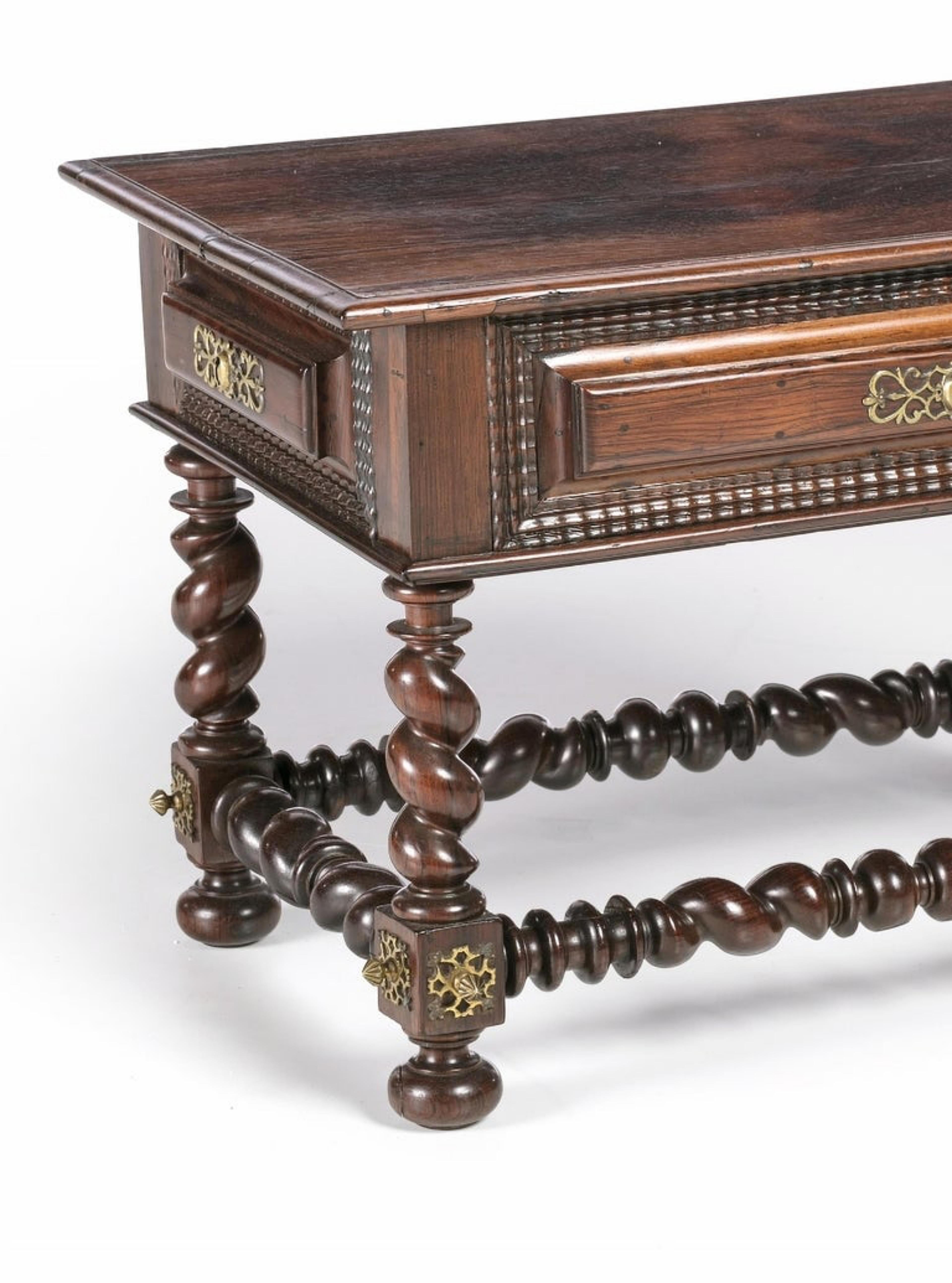 18th century Portuguese,
in Brazilian rosewood, turned legs and beams. gilt copper hardware and applications. 
With one drawer simulating two. Small defects. 
Dimension: 47 x 68 x 43 cm.
very good condition.