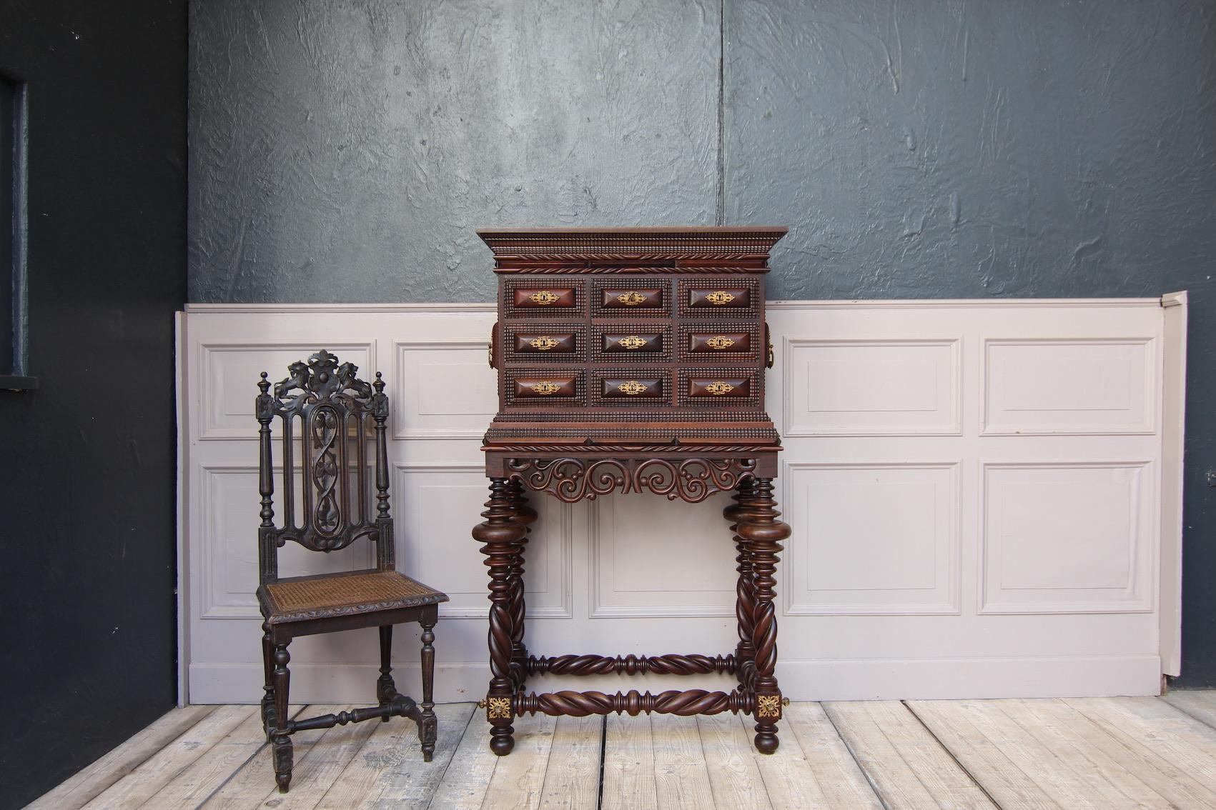 Portuguese cabinet with stand. Probably a quality replica from Lisbon from the 20th century of the famous Portuguese furniture from the colonial era in the 17th century, the 