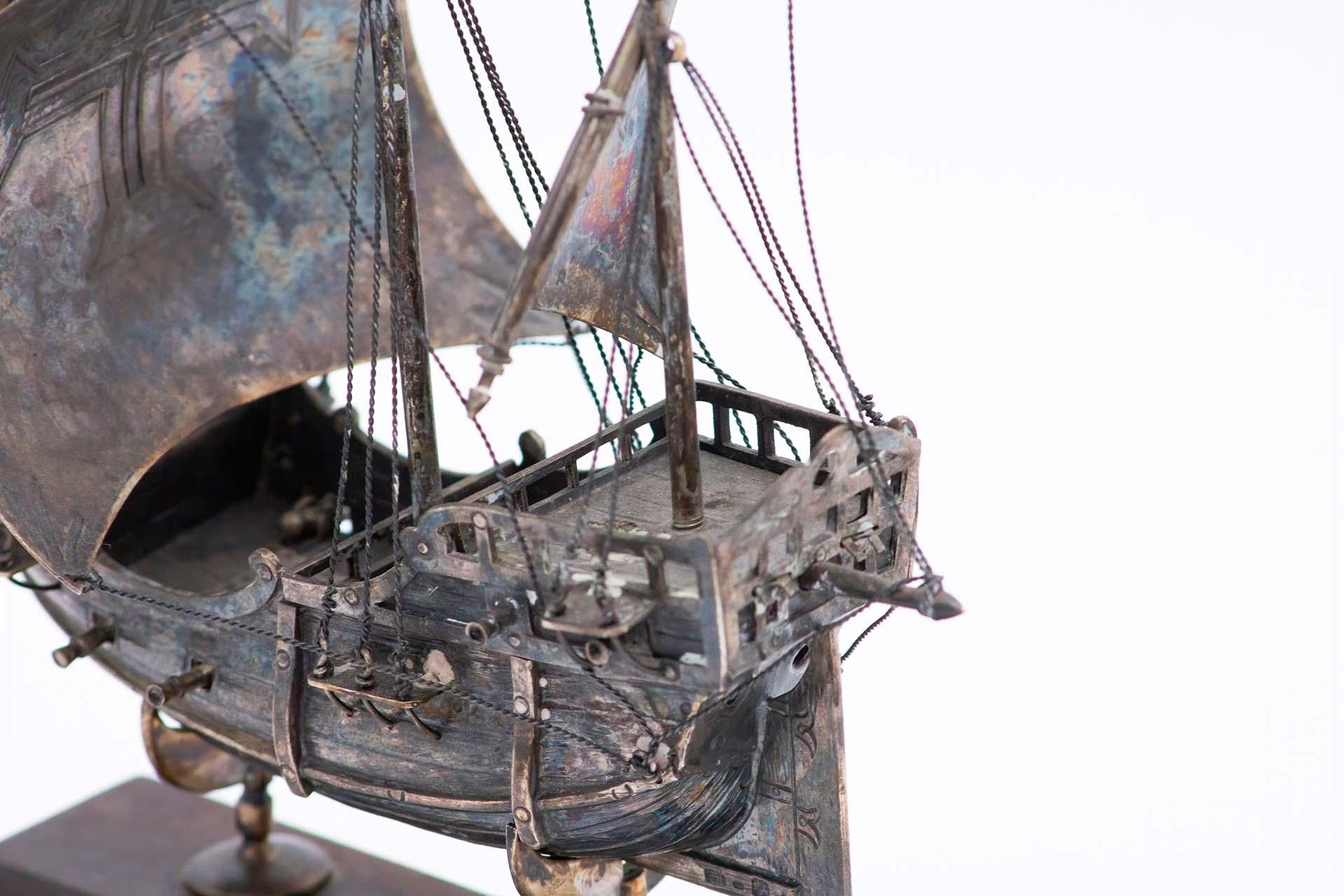 20th Century Portuguese caravel in profusely defined silver and set on a wooden base For Sale