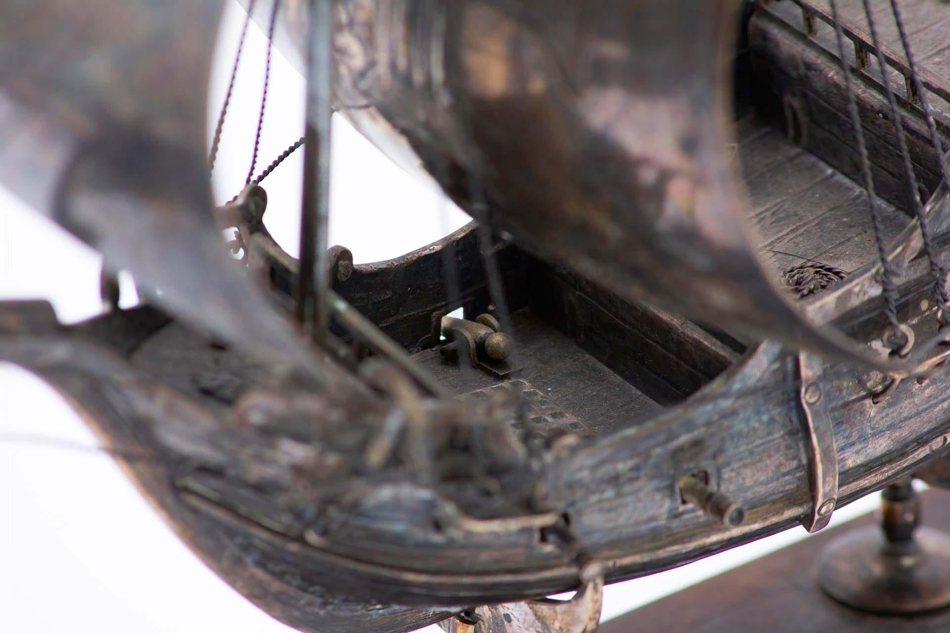 Silver Portuguese caravel in profusely defined silver and set on a wooden base For Sale