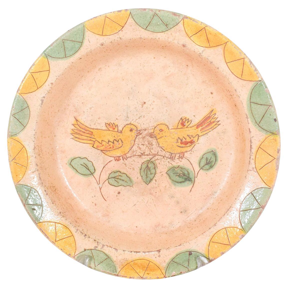 Assiette en argile portugaise peinte et émaillée