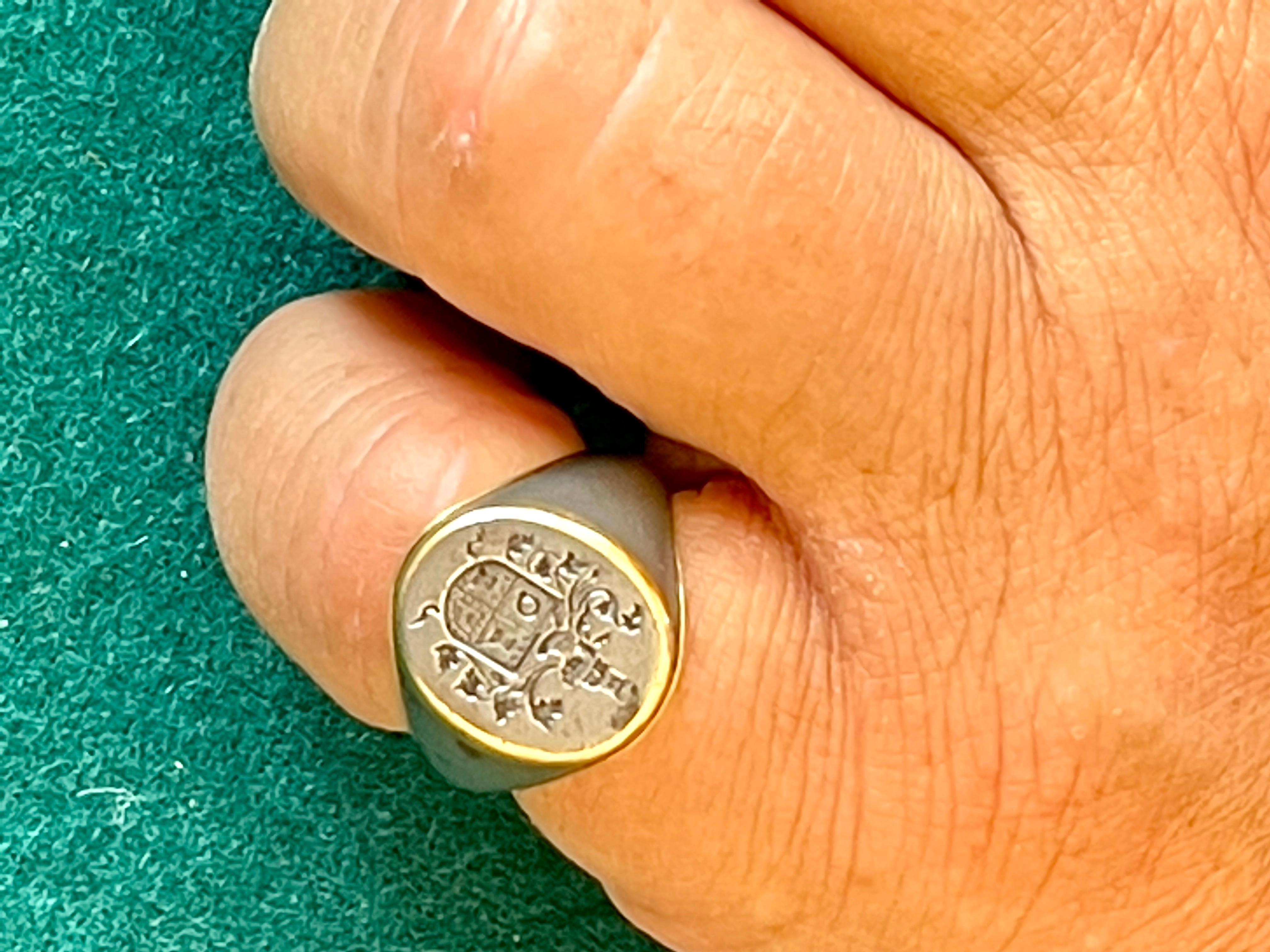 A Traditional Portuguese Signet Ring with the Coat of Arms of the Veloso Ferreira Family, made of a Steel and inlayed with 19.2 Karat  Portuguese Gold made in the early 90s for a portuguese noble man, that died before he could ever pick up the ring