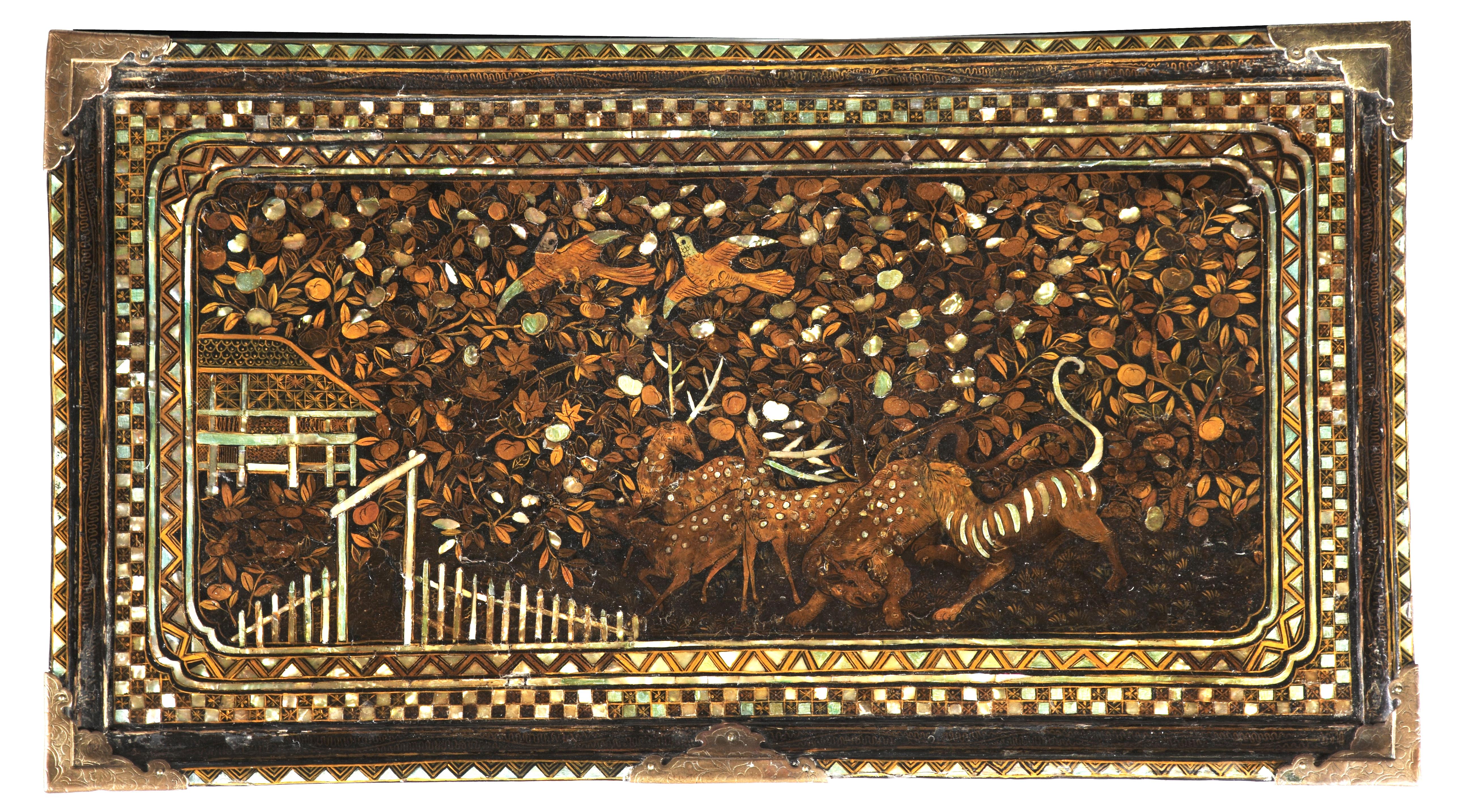 A Portuguese-colonial Japanese Namban lacquer vargueno cabinet

Momoyama period, circa 1600

 H. 43 x W. 64.5 x D. 36 cm

Wood, black lacquered and decorated with gold and inlays of mother-of-pearl, brass mounts and carrying handles, the fall front