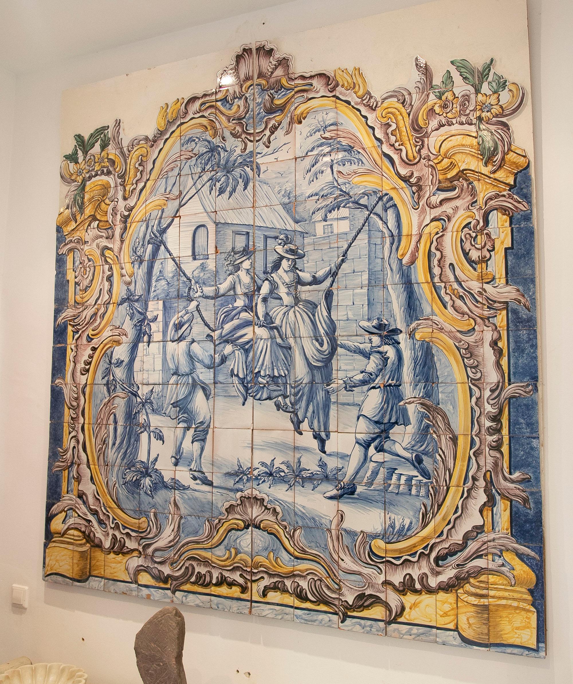 Portuguese decorative tile with a costumbrista scene of women playing on a swing with men. Scene from the 19th century