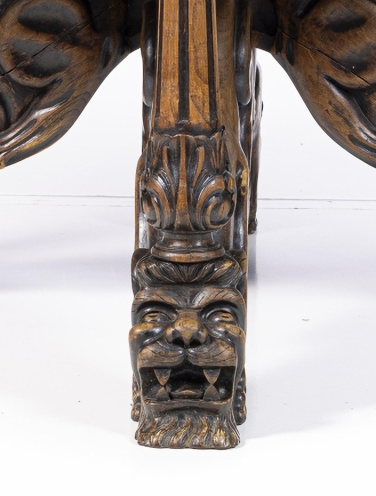 DINING ROOM TABLE

Portuguese end 19th Century
in chestnut wood. Standing on four carved wooden feet with a zoomorphic shape.
With a magnifying board.
Signs of use. Dim.: (closed) 82 x 140 x 140 cm
Dim.: (open) 82 x 140 x 180 cm
good conditions