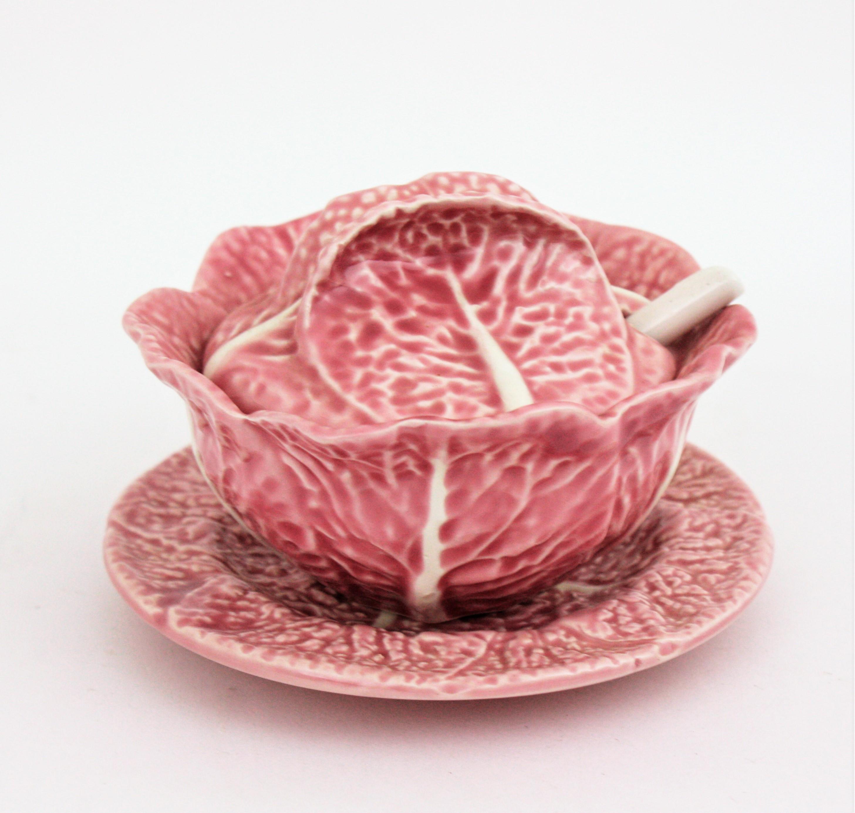 A lovely hand painted Majolica ceramic pink cabbage small tureen, sugar bowl or sauceboat with lid. Manufactured by Bordallo Pinheiro.
Portugal, 1960s
This eye-catching small cabbage tureen has a very realistic design with leaves thorough. The lid