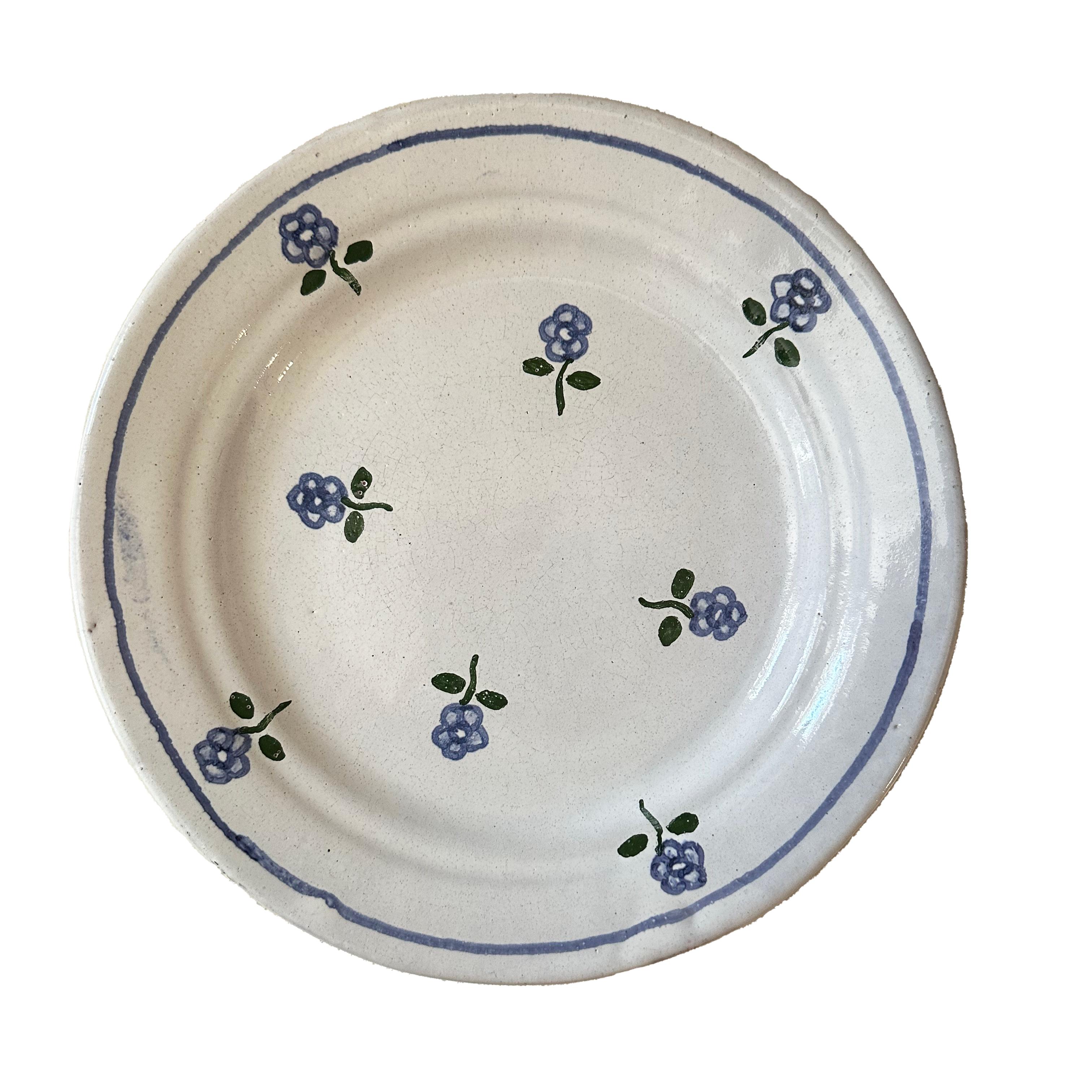 Immerse yourself in the intoxicating charm of European summers with this collection of vintage ceramic dessert plates, painstakingly hand-painted in Portugal. This set of four is an embodiment of artistry and distinctiveness, marked with the