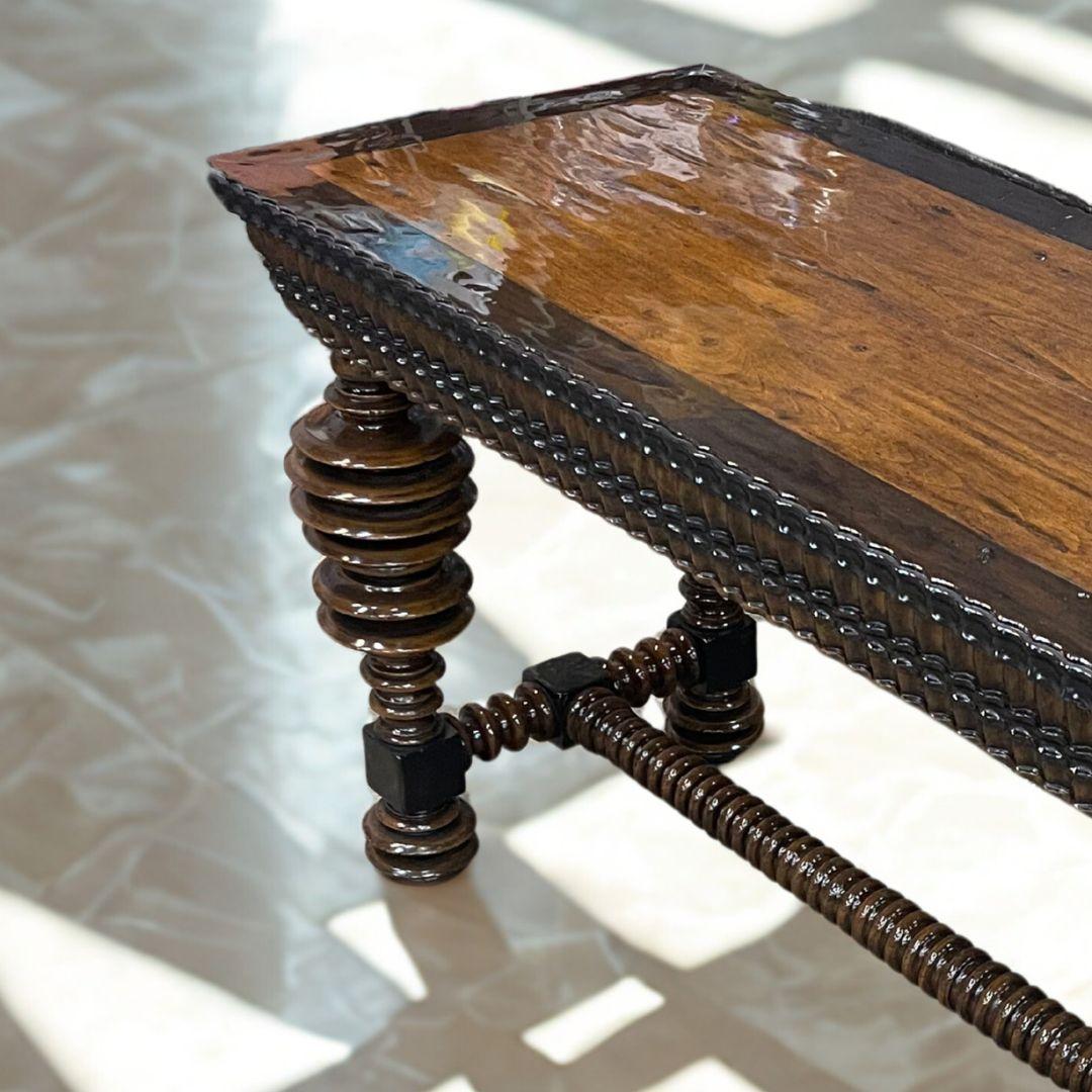 Martyn Lawrence Bullard's custom Portuguese library table.
The design taken from a table found in a quinta in Lisbon, the intricate turning and carved details make this piece highly unusual and very decorative. This piece can centre a room, become