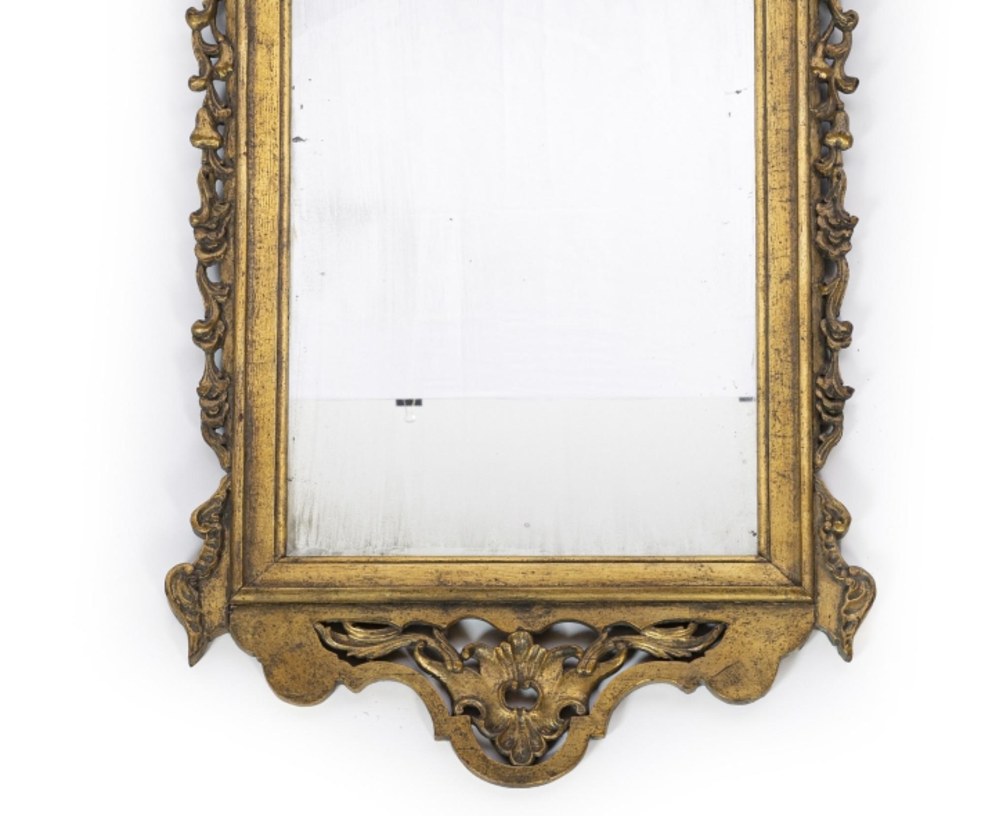 PORTUGUESE MIRROR 19th century

in carved, pierced and gilded wood.
Small defects.
Usage signs.
DIM.: 150 x 65 cm.
Good conditions.