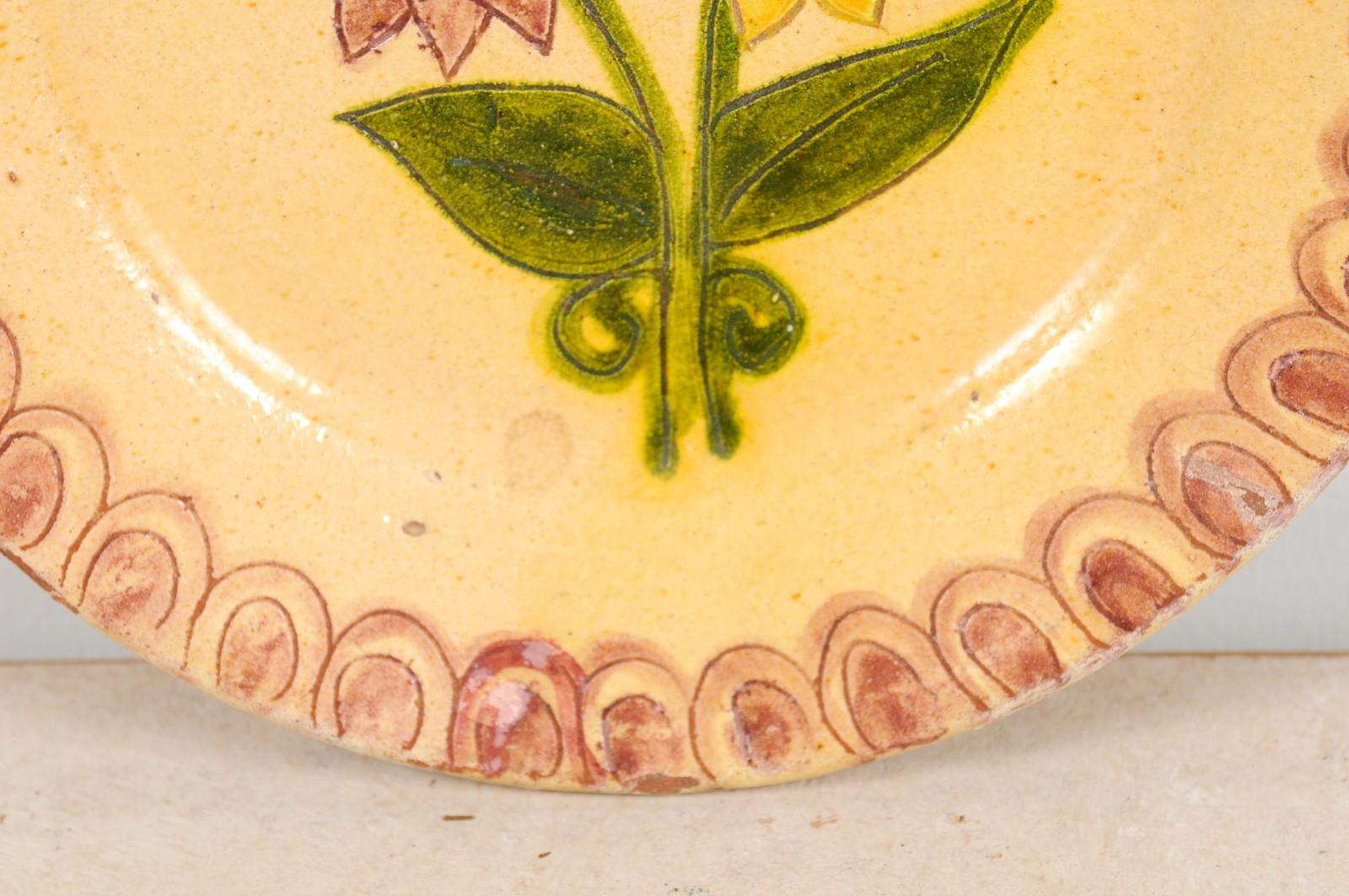 20th Century Portuguese Painted Clay Floral Pottery Plate with Pink, Yellow and Green Tones