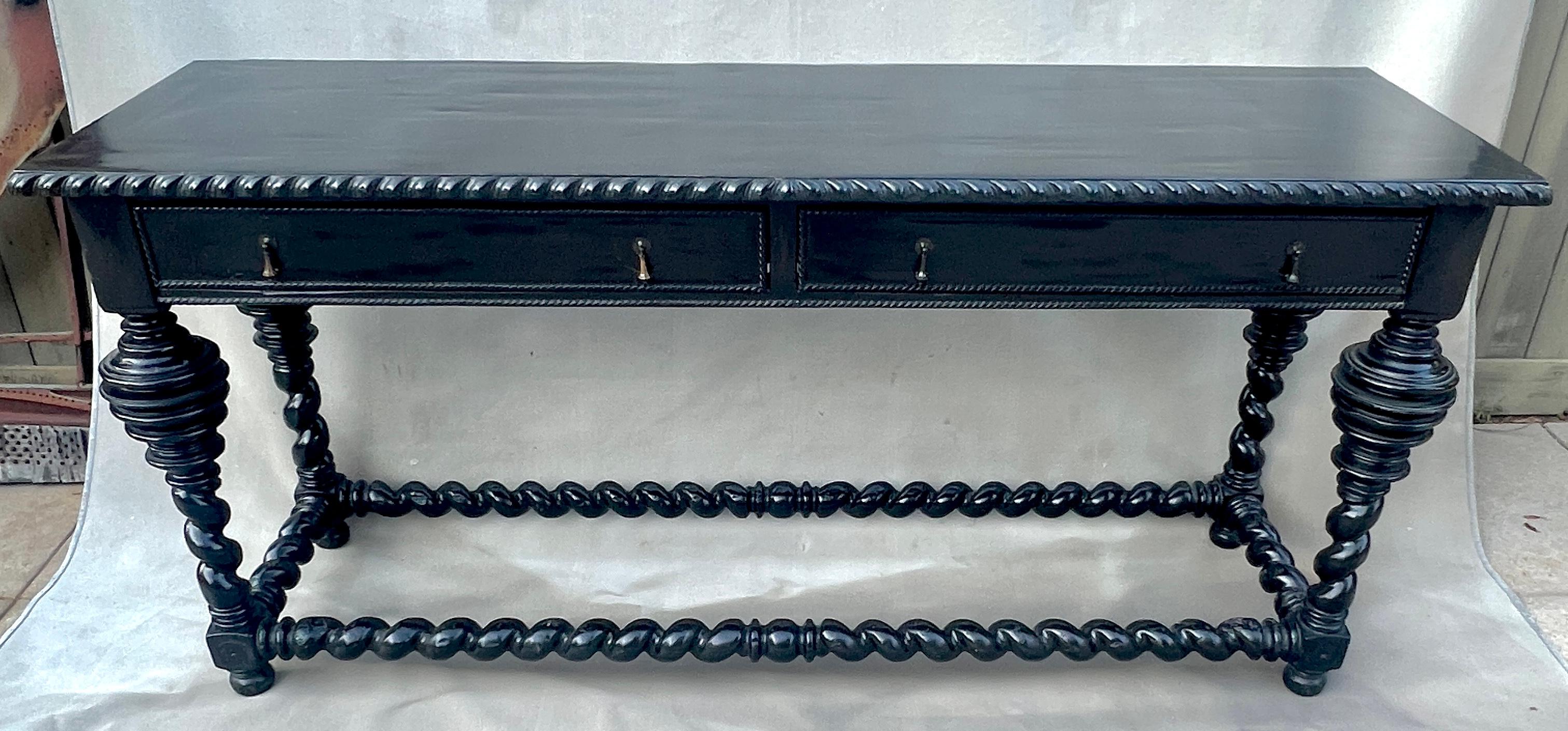 Portuguese style Ebonized Library Table with Turned Legs and Stretcher.  A wonderful table with a bold statement - an impressive piece along any wall or great as a sofa table / console.

A complement to many rooms - the den, living room, study or