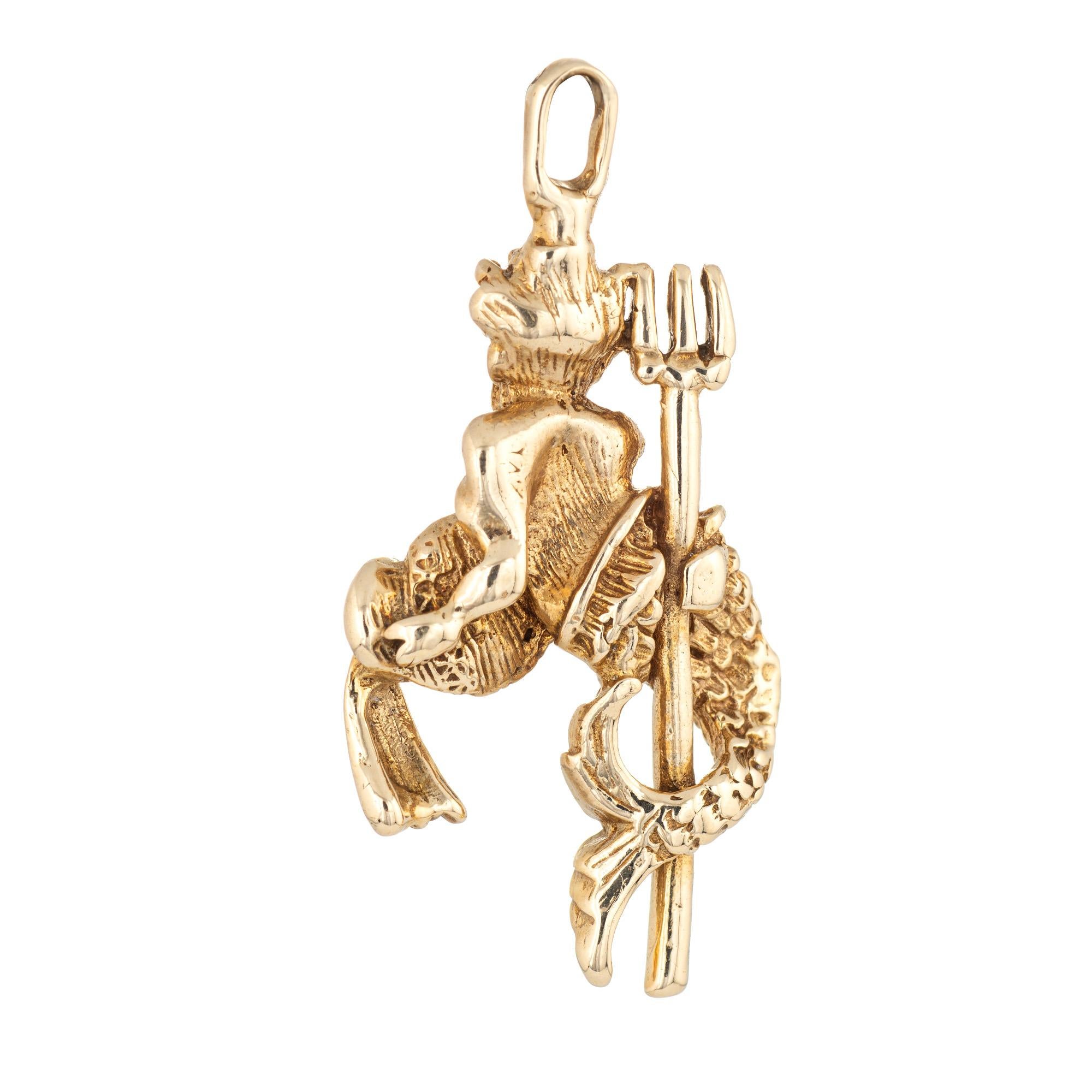 Finely detailed Poseidon charm (or pendant) crafted in 14k yellow gold.  

The nicely detailed charm is medium in scale and features Poseidon, Greek God of the sea, storms, earthquakes and horses. The protector of seafarers and his Roman equivalent