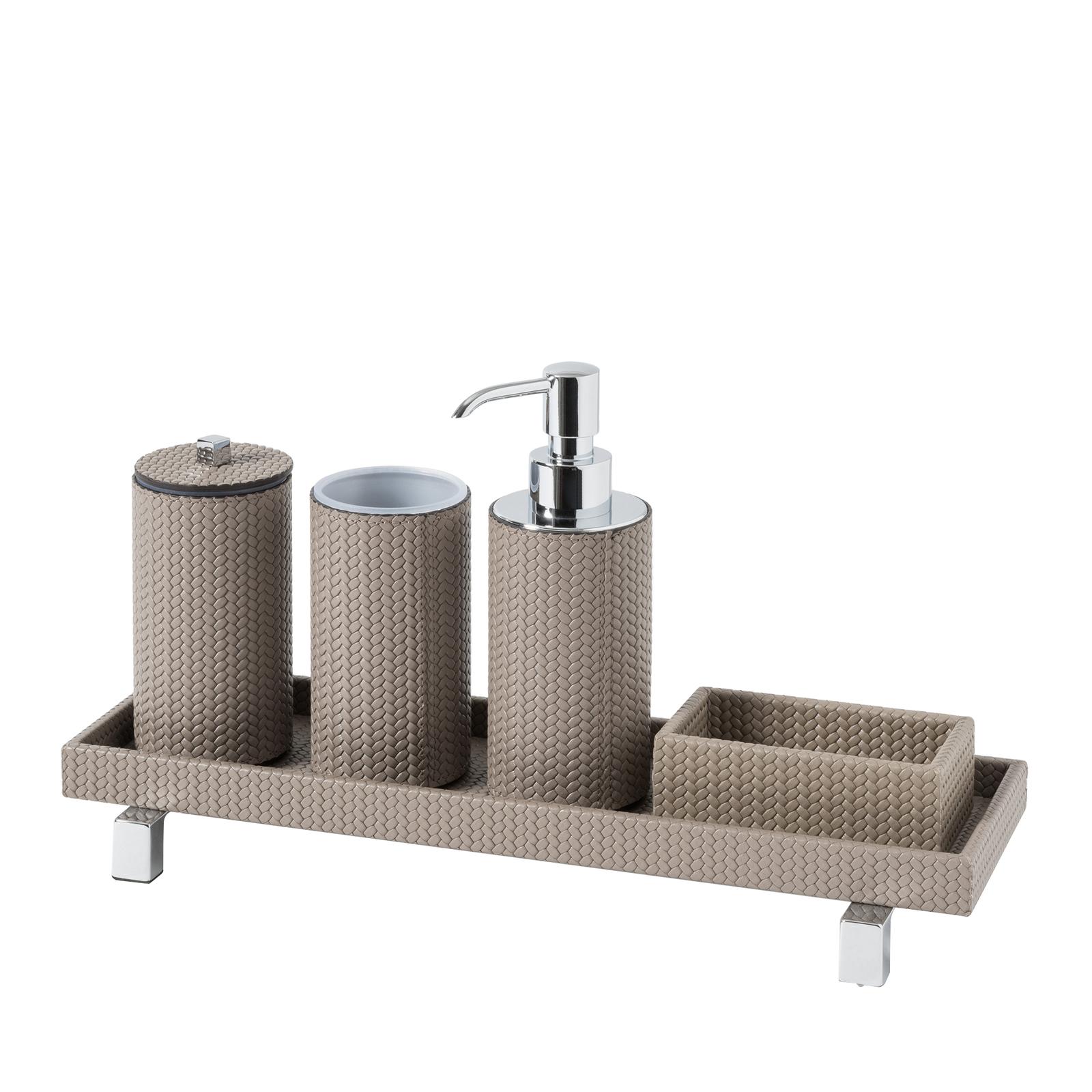 A stunning and elegant addition to a contemporary bathroom, this set is crafted of leather and is part of the Poseidon collection. It features a rectangular tray supporting an open container and three accessories with a round base: a soap dispenser,