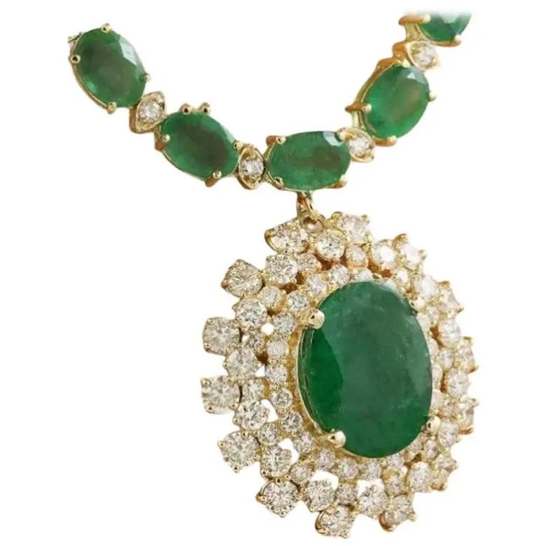 
 18K Yellow Gold Diamond Necklace  Total Necklace Weight: 36 Grams Necklace Length: 45.72cm Center Emerald Weight: 6.61 Carat (14.60x11.10 Millimeters) Side Emerald Weight 40.10 Carat (7.00x5.00 Millimeters) Diamond Weight: 5.06 Carat (F-G Color,
