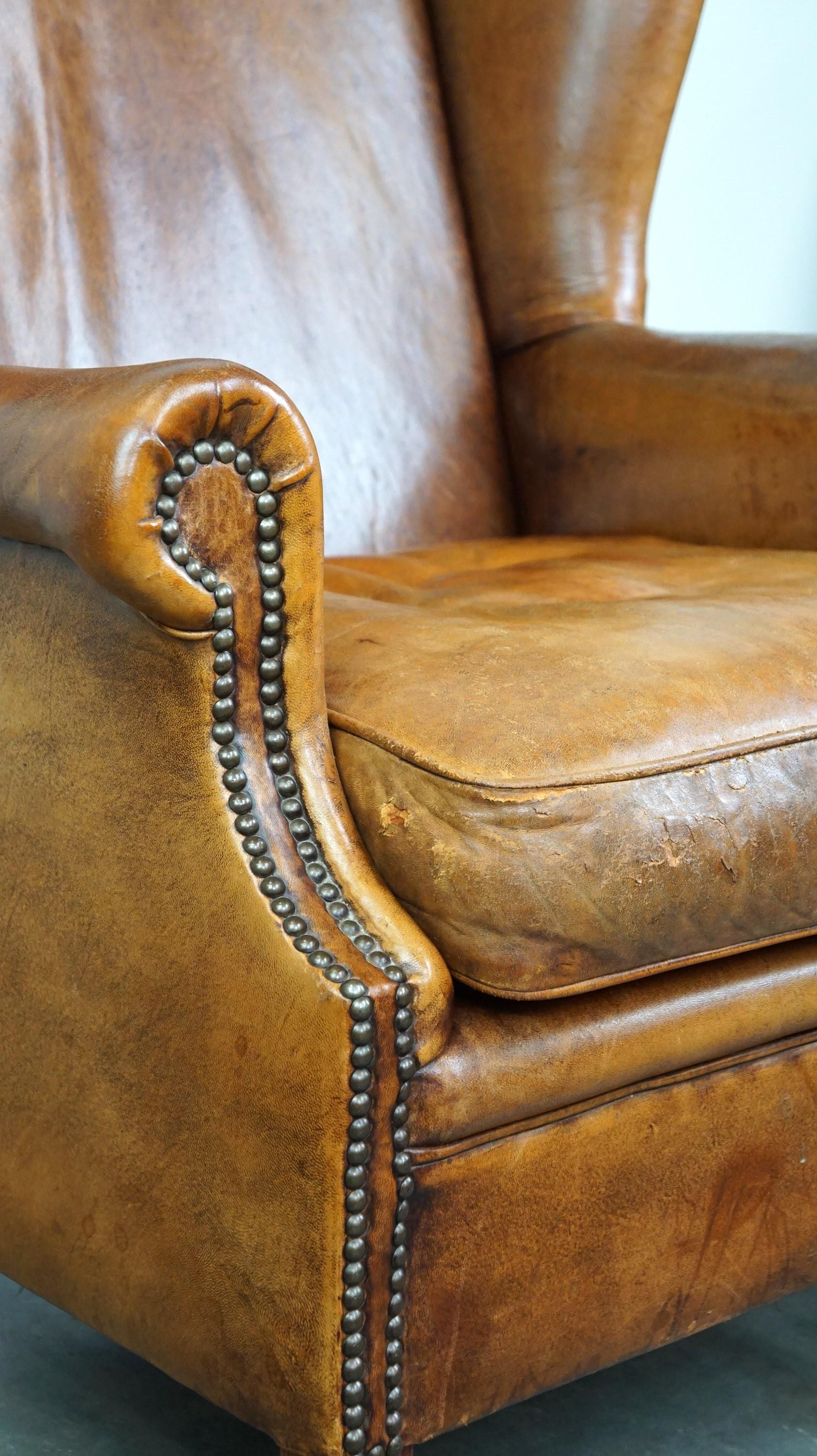 Positively lived-in sheepskin leather wing chair with pleasant seating comfort 3