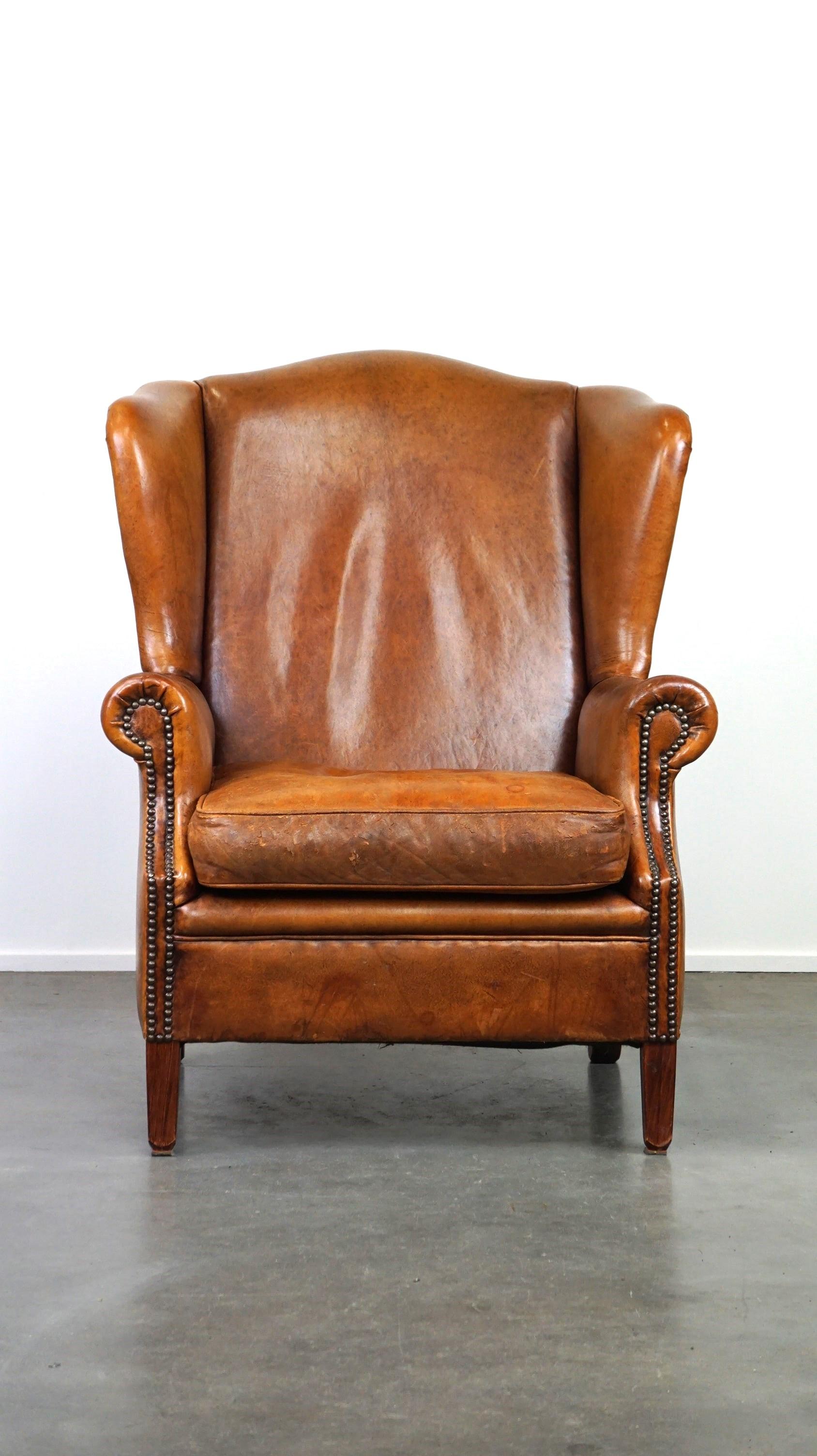 
Offered: this delightful and charmingly lived-in sheepskin wingback armchair with excellent seating comfort.

A beautiful sheepskin wingback armchair is a must-have for your interior, in our opinion. Whether you have a classic or modern decor, this