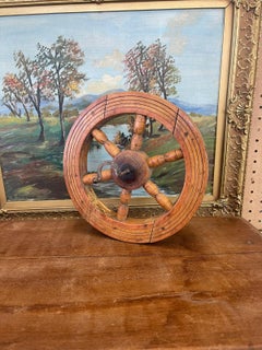 Roue tournante en bois probablement ancienne.