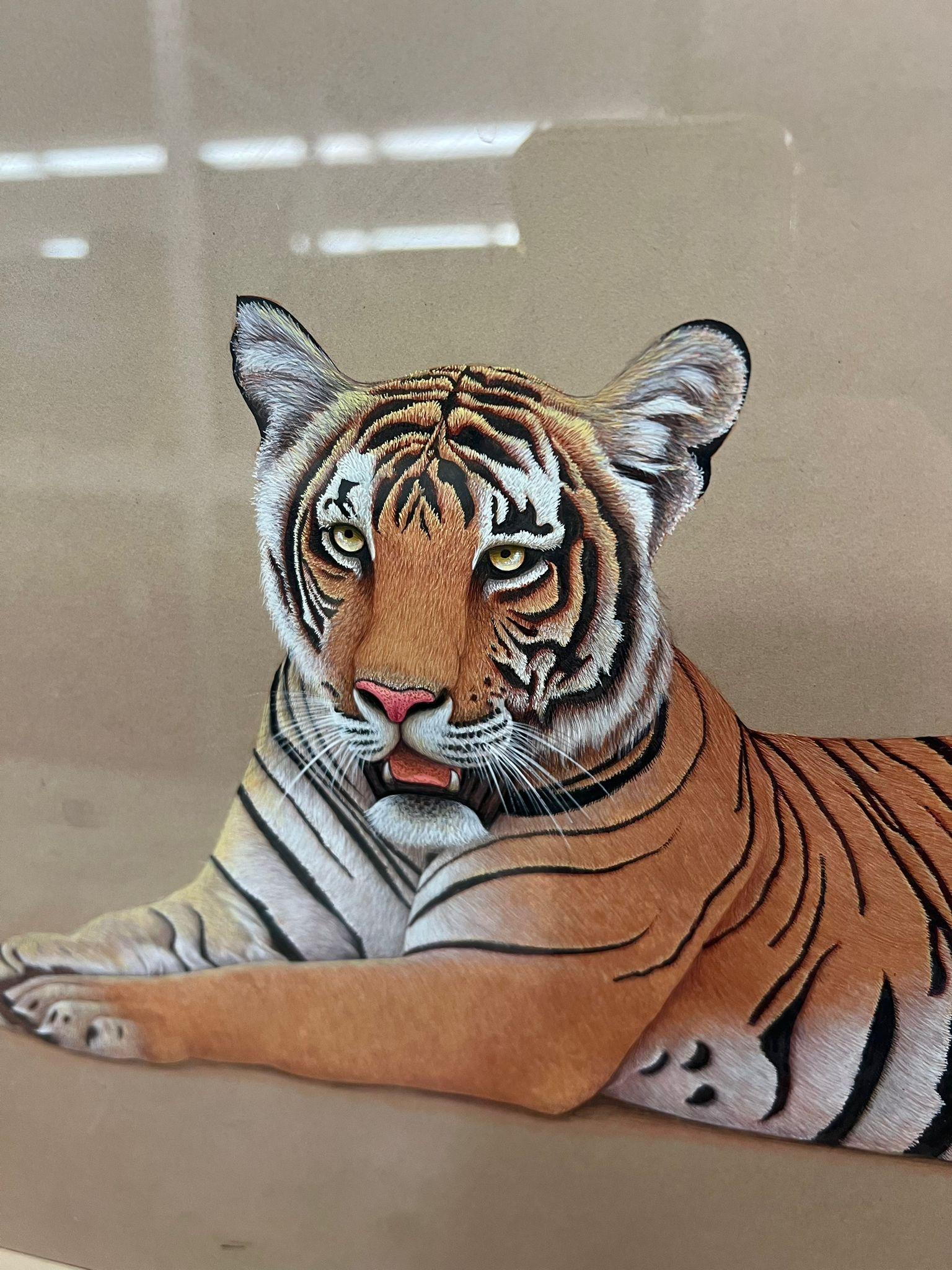 This original Tiger Art piece is in India Import and possibly mixed media. It is matted and framed in an antique frame. This Piece has nice patina and character. Vintage Condition as pictured. Listing is for described item only.

Dimensions. 28”W ;
