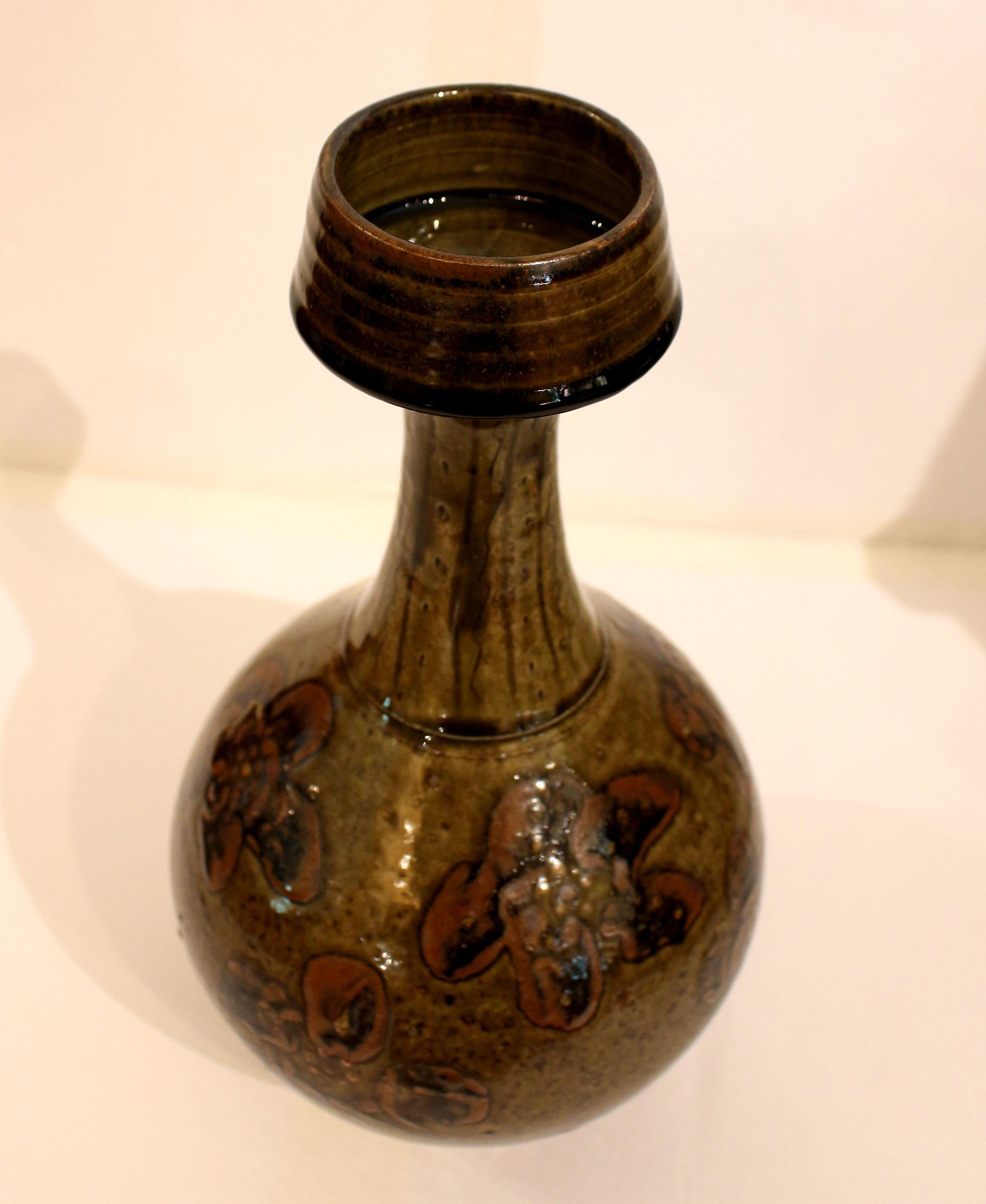 Post-1995 long neck pottery vase by Mark Hewitt. An exceptionally fine example with floral motif. Post-1995 stamp plus 