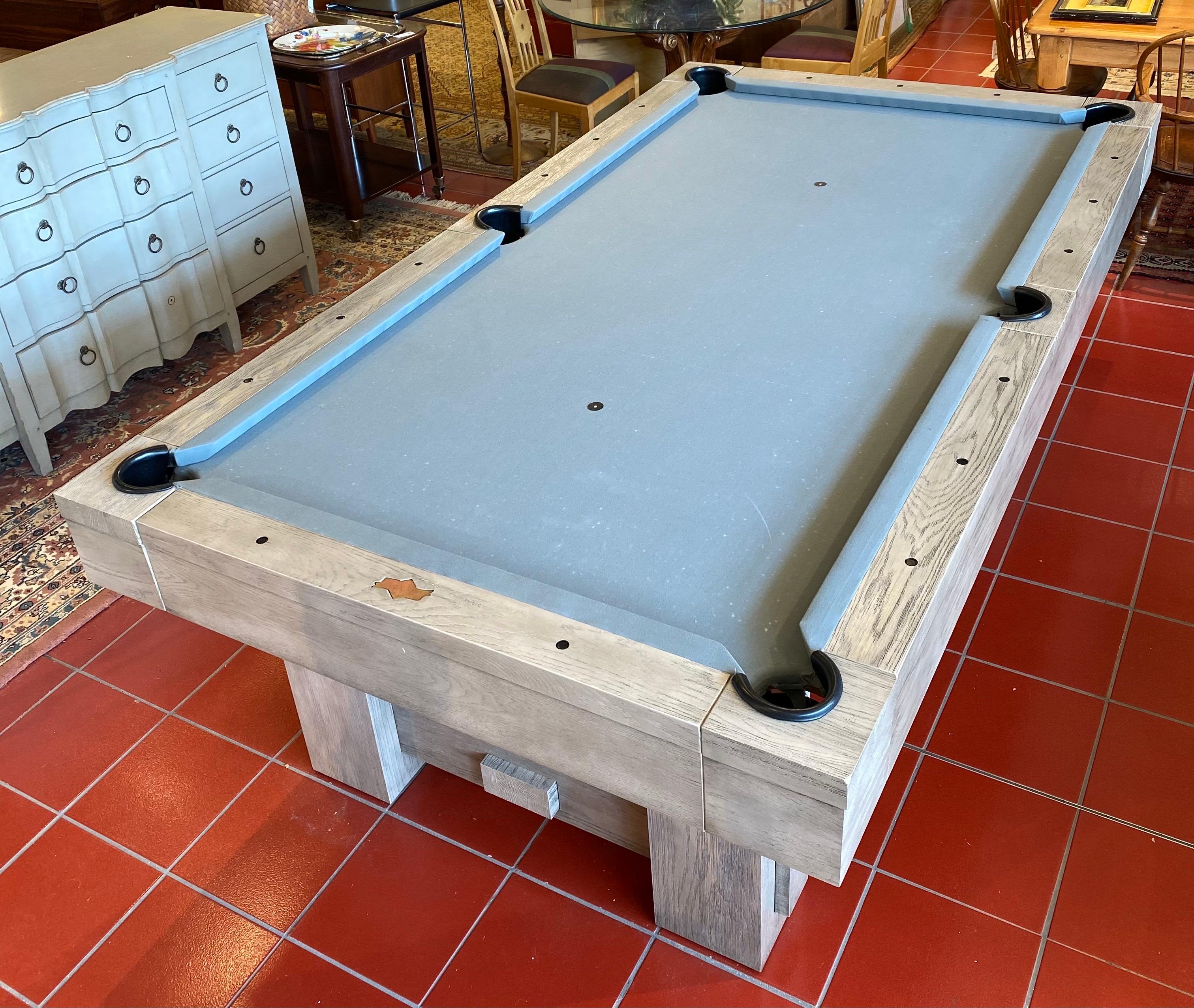 Post and beam design weathered finish pool table.

Measures: 100
