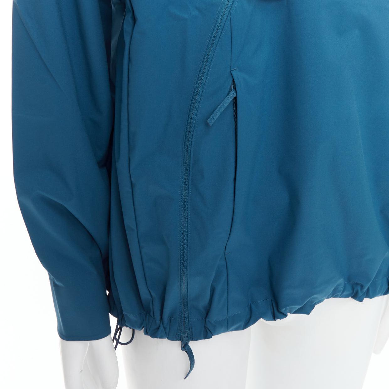 Veste à fermeture éclair latérale bleu sarcelle Technical Center ARCHIVE FACTION 6.0
Référence : TGAS/E00822
Marque : Post Archive Faction
Modèle : 6.0 Centre technique
Matériau : Polyester
Couleur : bleu, vert
Motif : Solide
Fermeture :