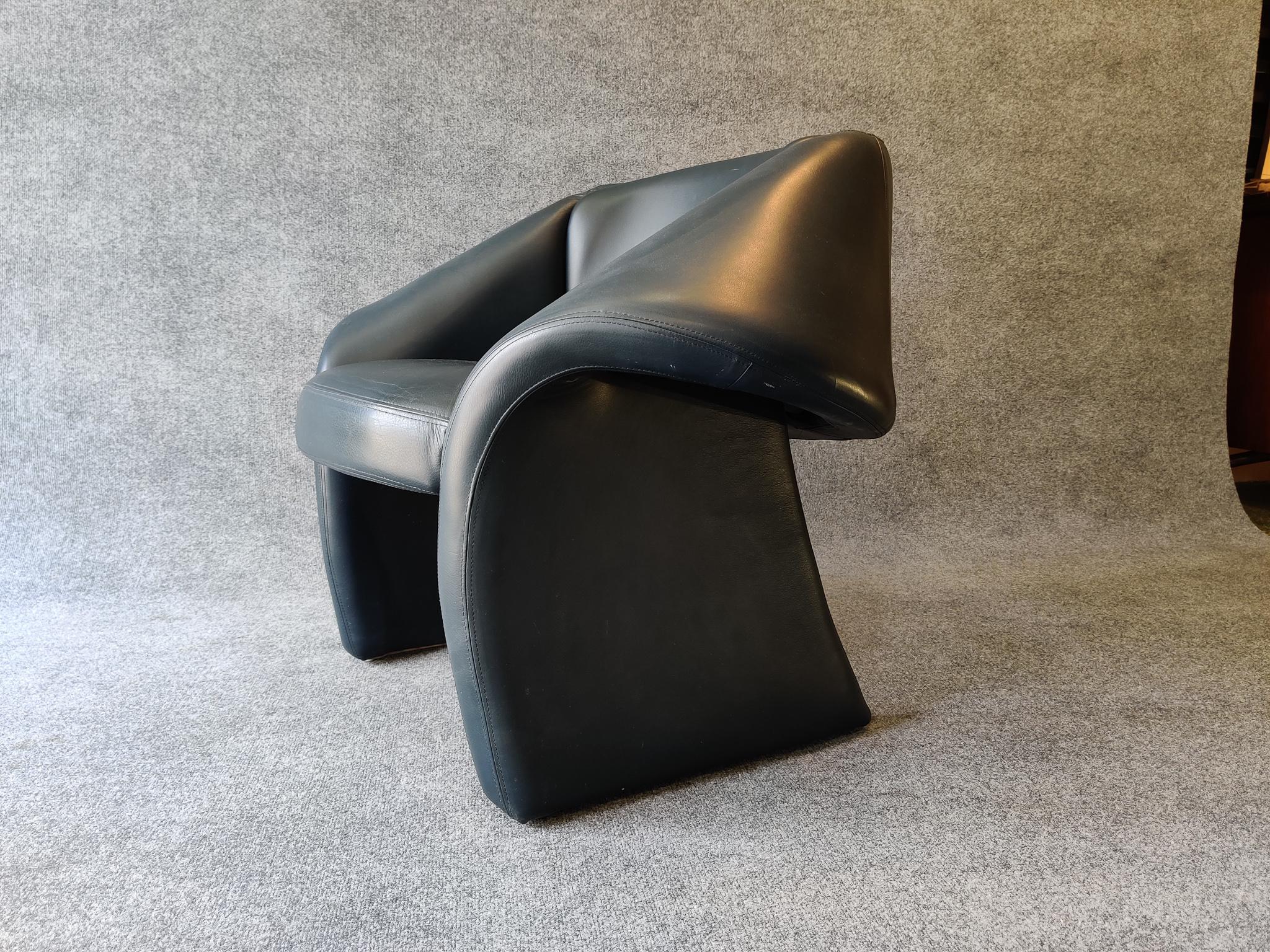 A super sculptural and very comfortable all leather (dark blue) arm or lounge chair. Produced in the US in the late 1970's or early 1980's. This dynamic chair has an incredible presence, with an overall form that's reminiscent of the Pierre Paulin