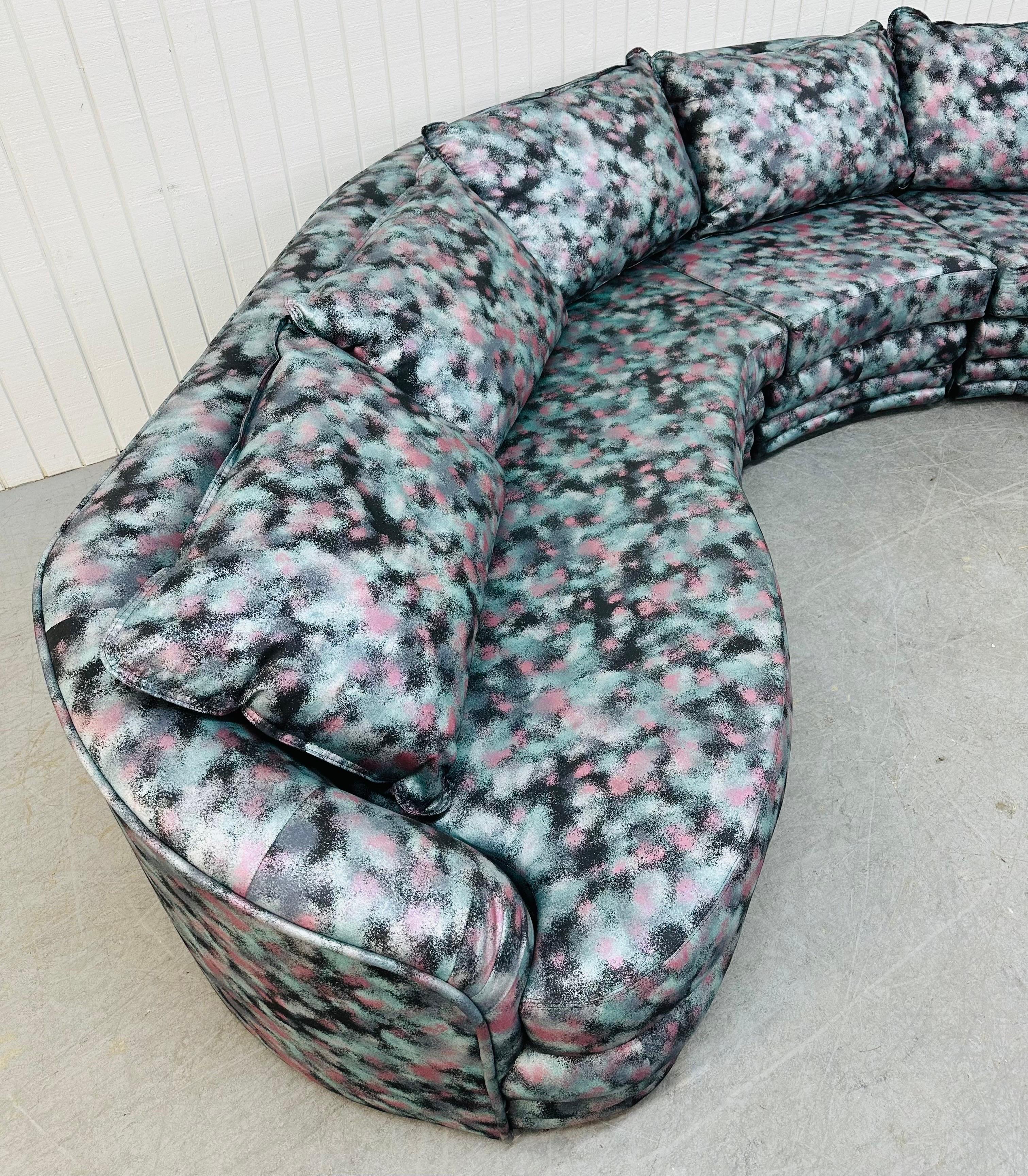 This listing is for a Post-Modern 3-Piece Curved Sectional Cloud Sofa. Featuring three pieces that come together to make a large curved sofa, cloud style design, original abstract upholstery, and original pillows. This is an exceptional combination