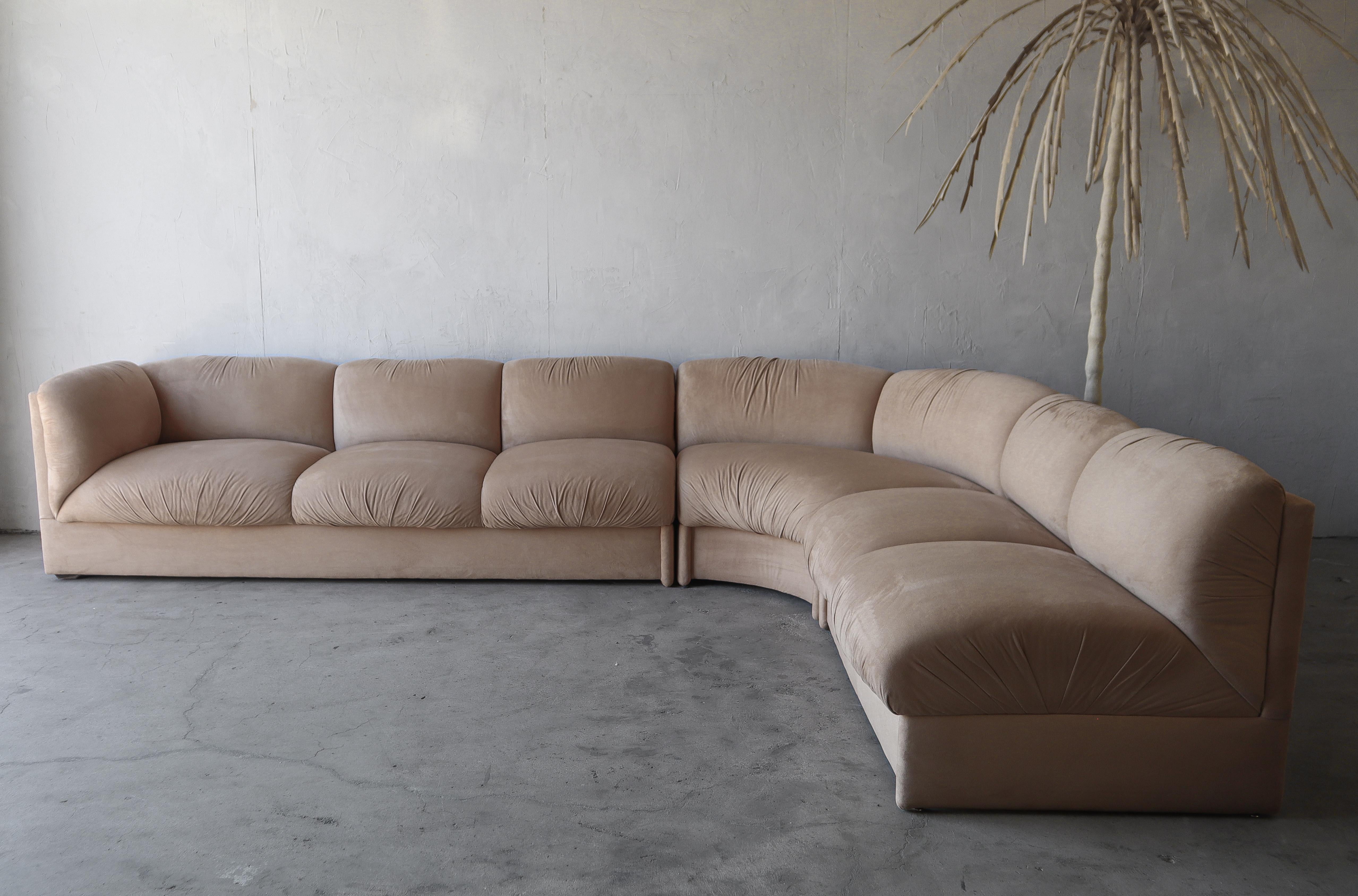 Beauty is in the details of this gorgeous Weiman sectional sofa.  I love the curves and the rouching on every cushion, it adds so much interest and design flair.  Taking it from a simple sectional to a real designer piece.

The sofa came from the