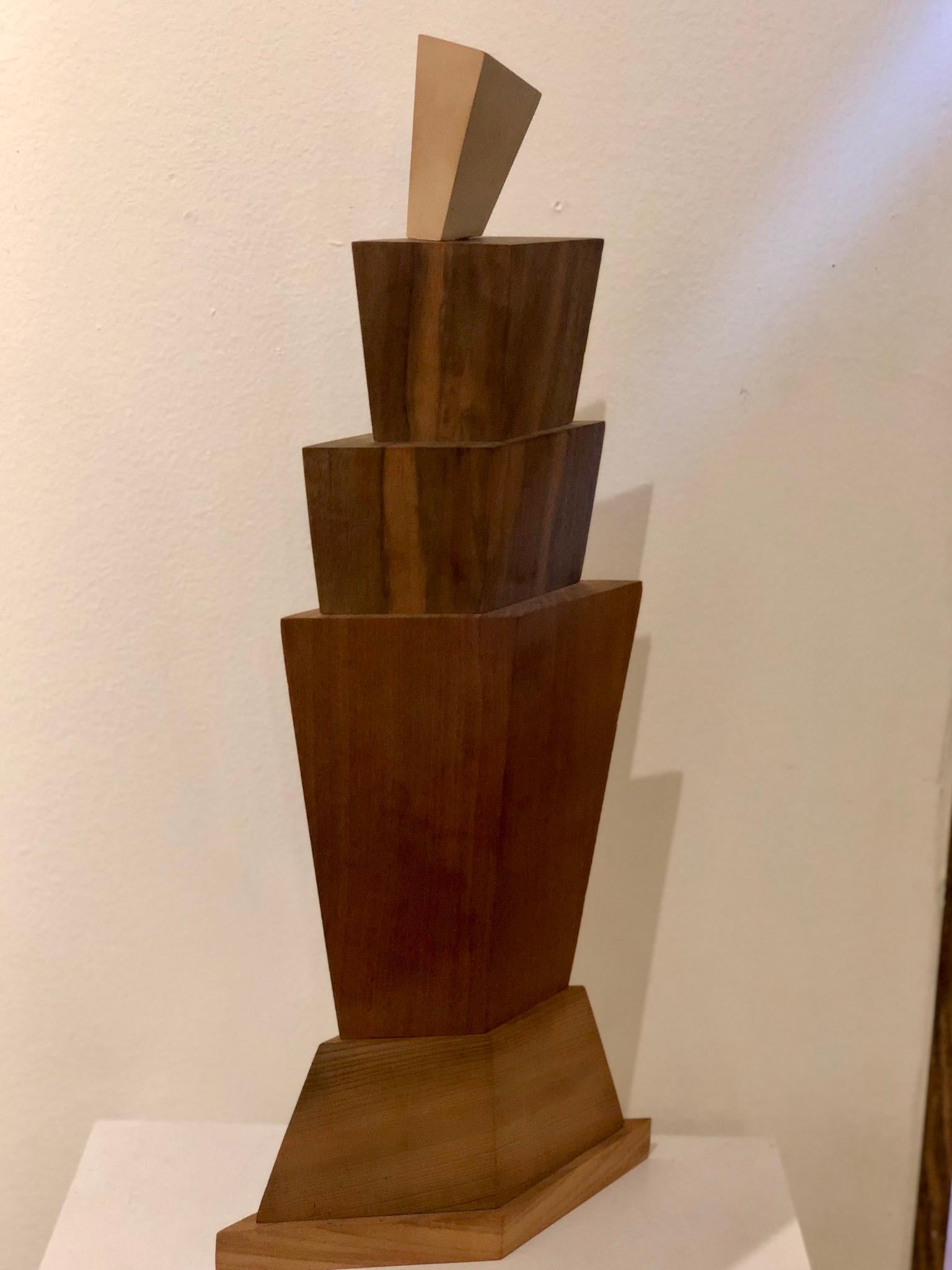 Well done sculpture by Listed artist John Rogers, circa 2003 signed and dated, in mix woods, Mahogany, walnut birch. Born in Des Moines, Iowa. John soon moved with his parents to Duluth, Minnesota, Great Falls, Montana
and then to La Crosse,