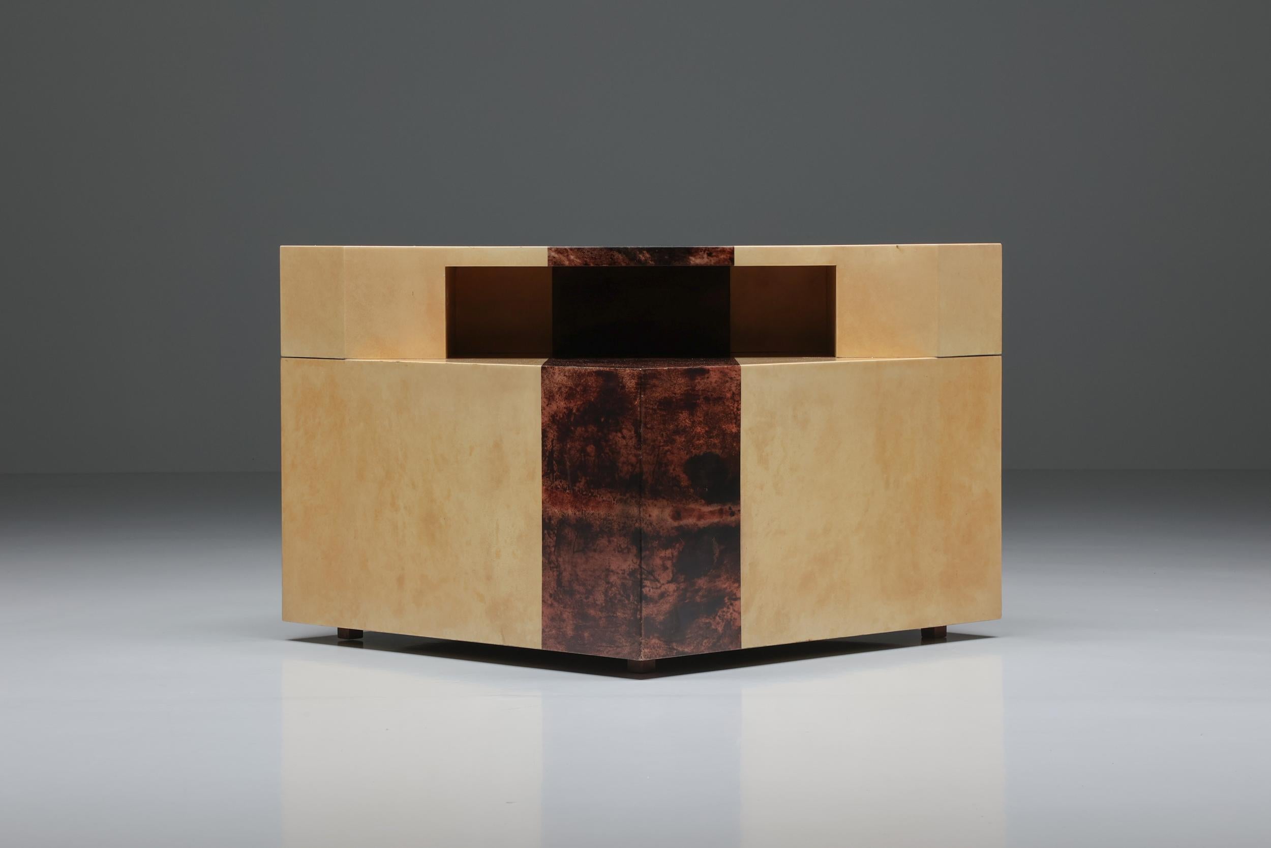 Post-modern two-one console corner side table by Aldo Tura, a true gem of 1970s Italian craftsmanship. This Hollywood Regency masterpiece showcases the exquisite artistry of lacquered parchment, marrying two contrasting tones in a visually striking