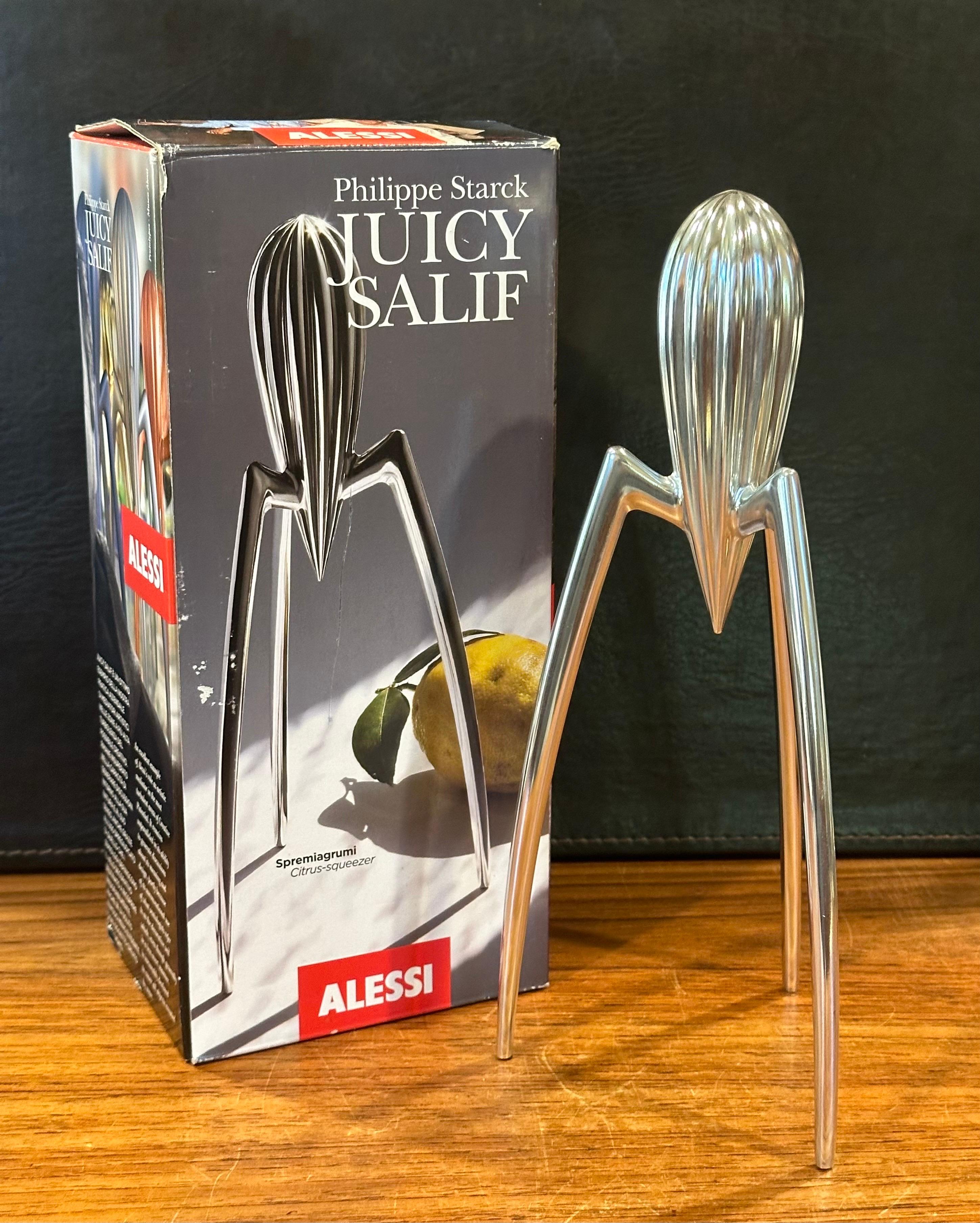 A classic post-modern aluminum lemon squeezer with original box by Philippe Starck for Alessi, circa 1990s. The piece is in very good vintage condition, measures 5