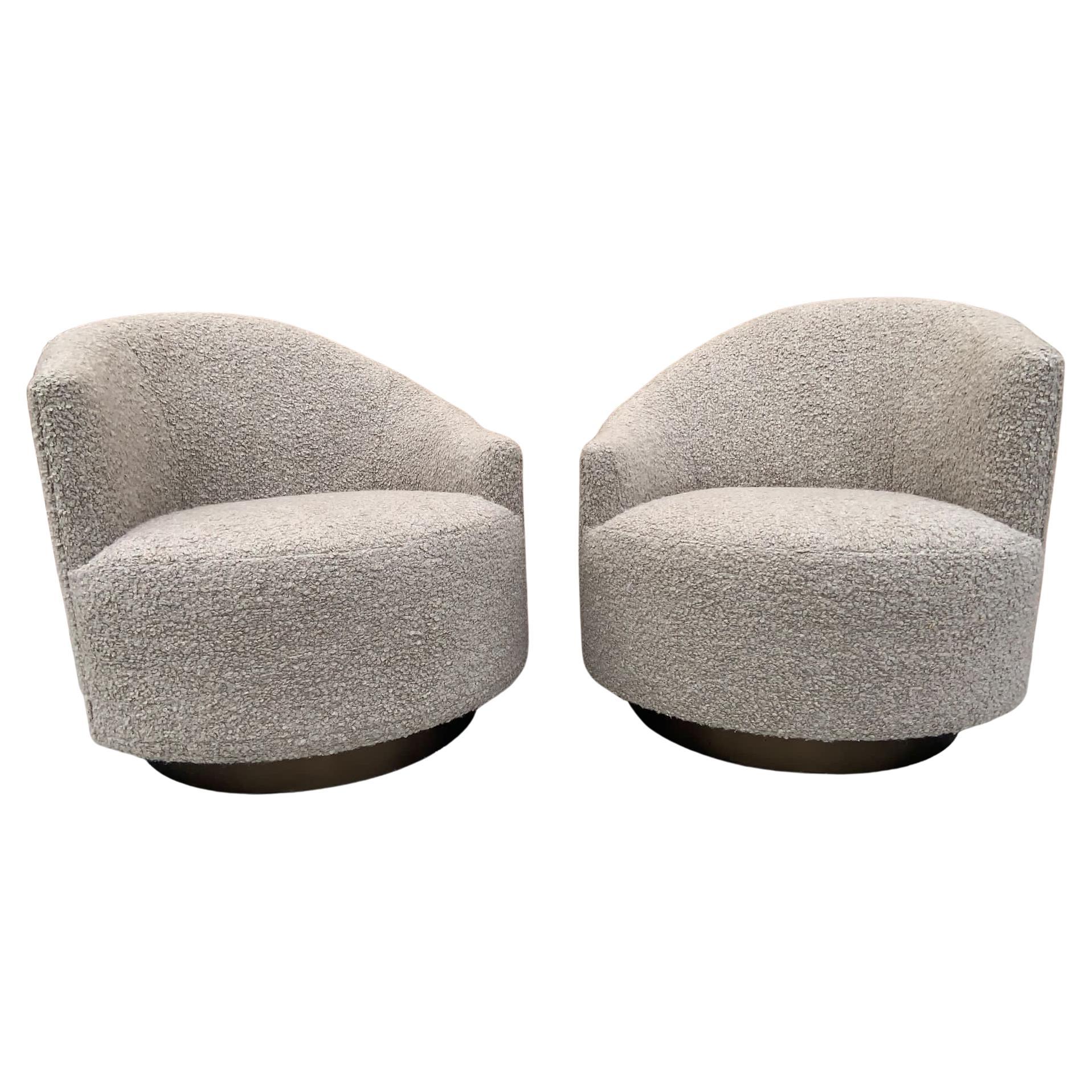 Post Modern Asymmetrical Barrel Back Swivel Chairs Newly Reupholsterd in Cream bouclé on a Bronze Base

circa:1990

Dimensions:
H 32”
W 31”
D 32”
Seat H 17”.