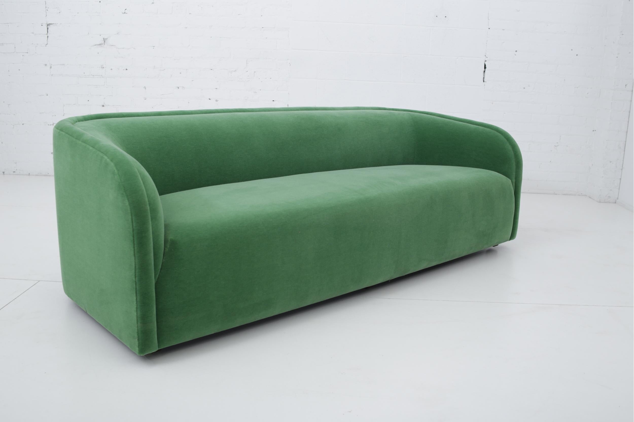 Fully restored 1980s Postmodern sofa. Reupholstered in green mohair.