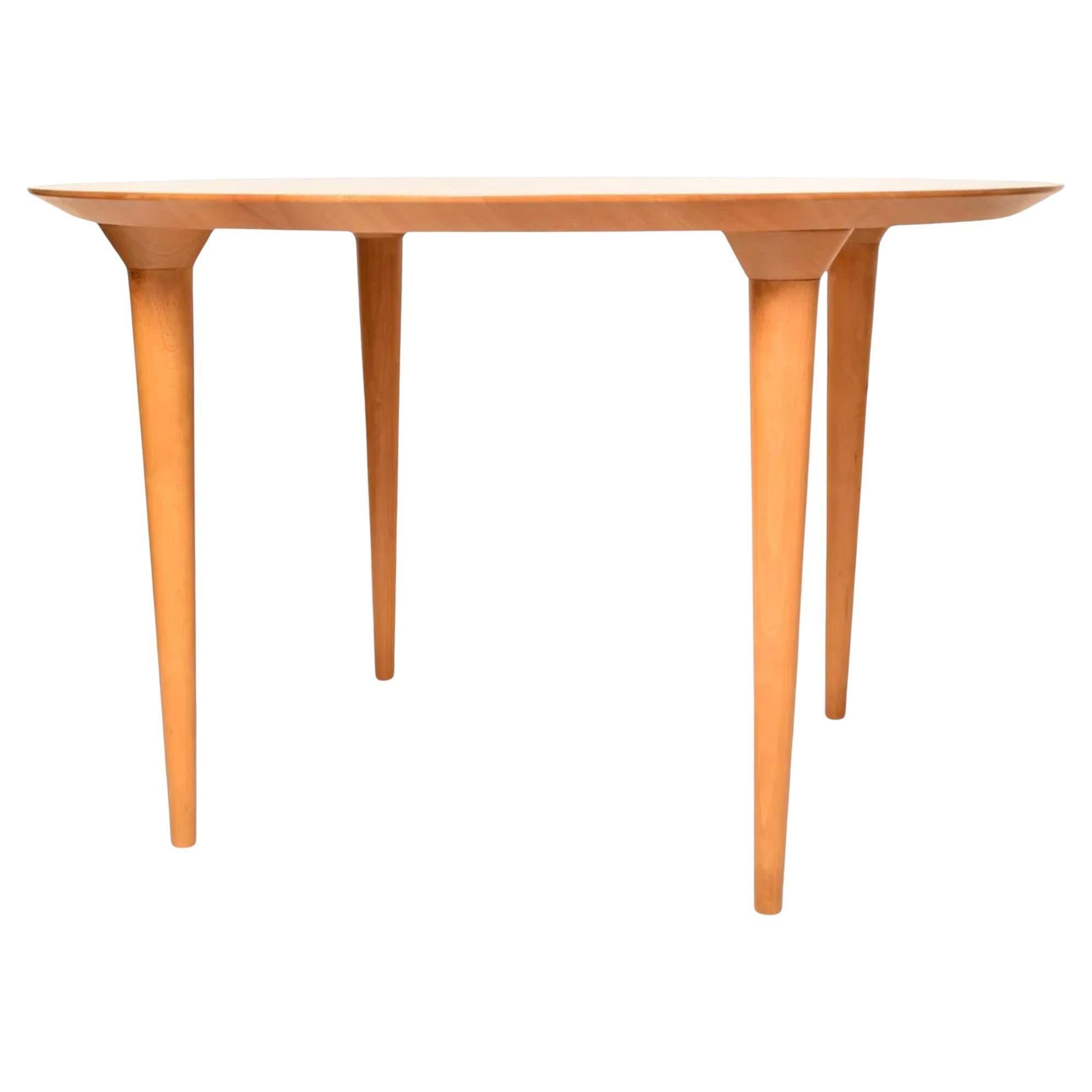 Post modern beech round dining Table by Lluis Clotet. Clean pre owed table
Labeled Parco Coffee Table Aleph Atlantide Designer Lluis Clotet
Made in Italy - Located in Broooklyn NYC.

Measures 46” Dia x 29” high  