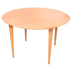 Table de salle à manger ronde post-moderne en hêtre avec pieds effilés de Lluis Clotet