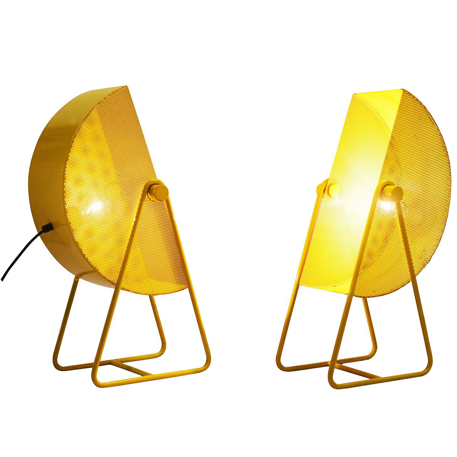 Postmodern Memphis style adjustable table lights in yellow coated metal. 
The shades are perforated and create a nice light partition. 
The lamps have a very contemporary appearance due the sharp lines and geometrical shapes.

Measures: W 25, D
