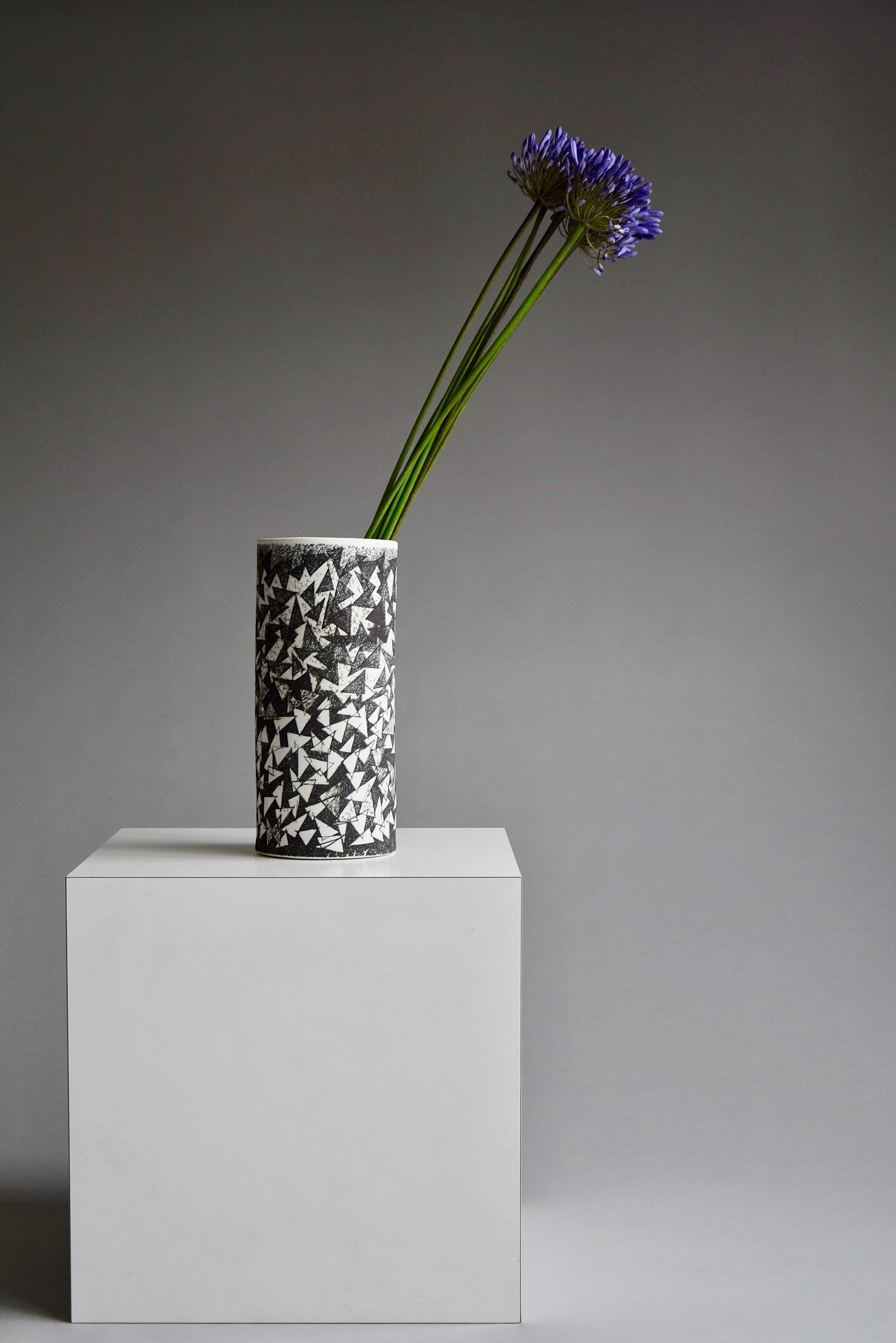 Beautiful black and white post modern signed ceramic vase by Mik Becka. 
Mik Becka has a series of iconic buildings to his name at the age of 80.
He built a number of community houses, the 'Bosjes van Zanen' luxury apartments, the banking building